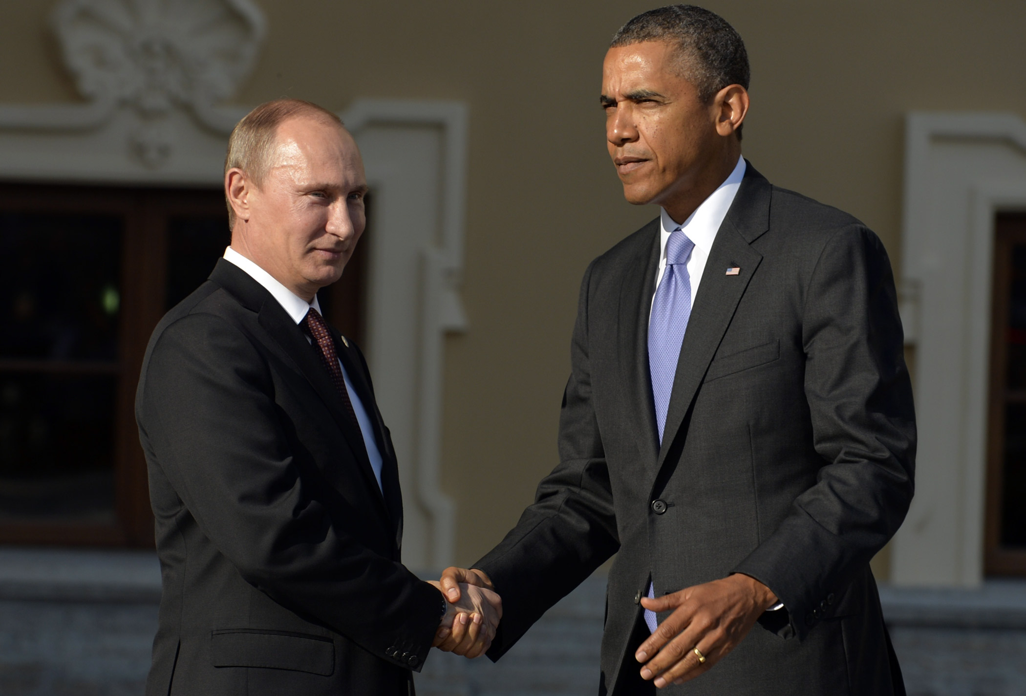 Russian President Vladimir Putin and U.S. President Barack Obama shake hands at the G20 summit in Saint Petersburg on Sept. 5, 2013.