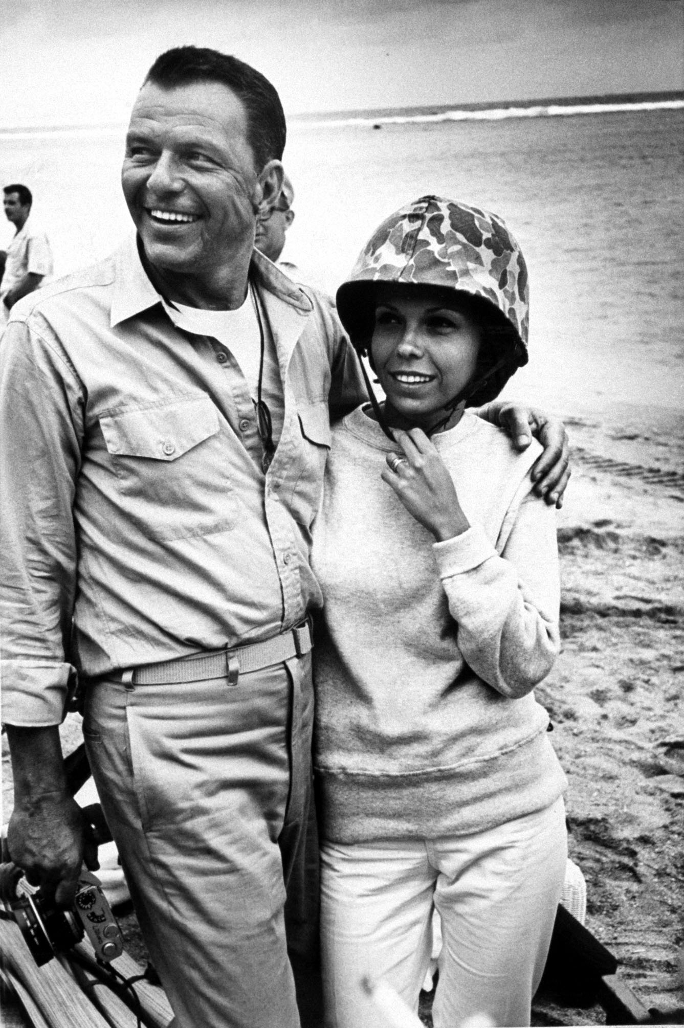 Nancy Sinatra with father, Frank Sinatra, during producing and directing of movie "None But The Brave," 1964.