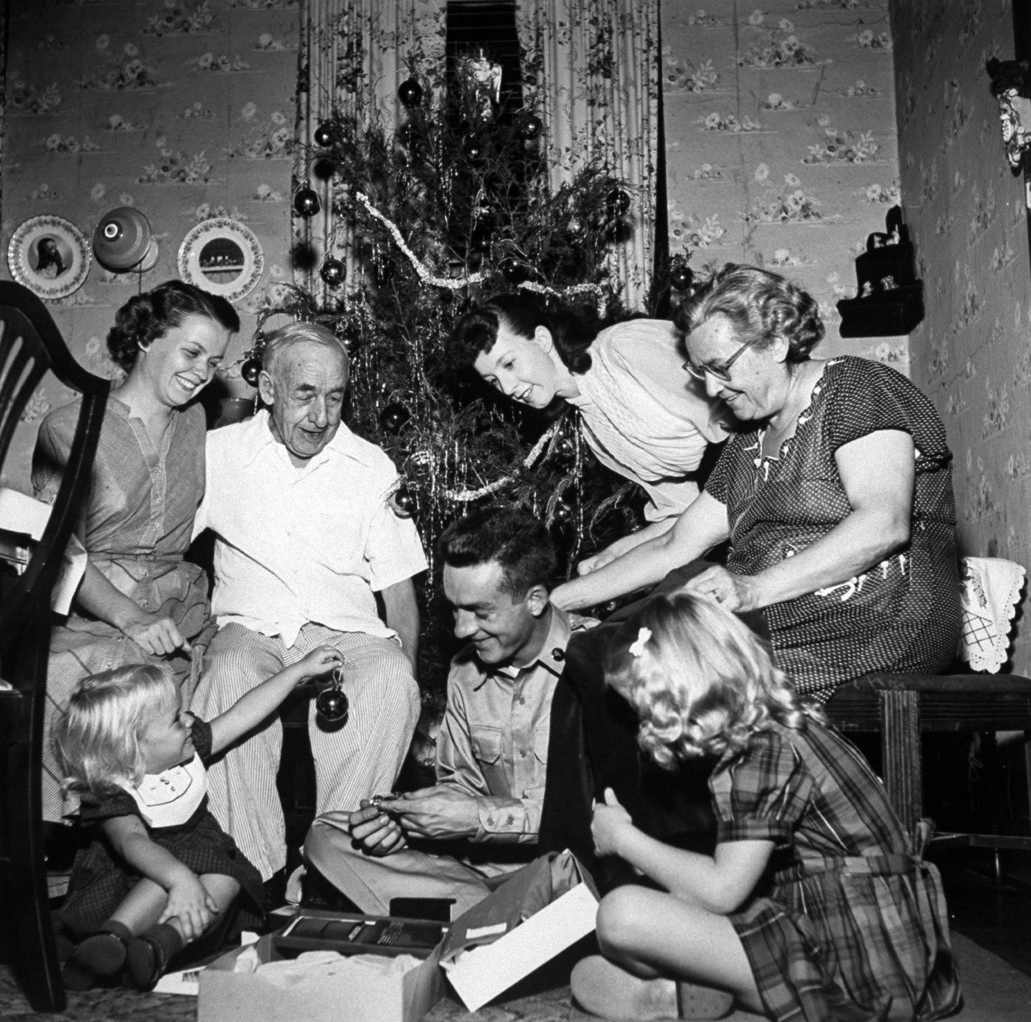 A family celebrating Christmas, 1953.