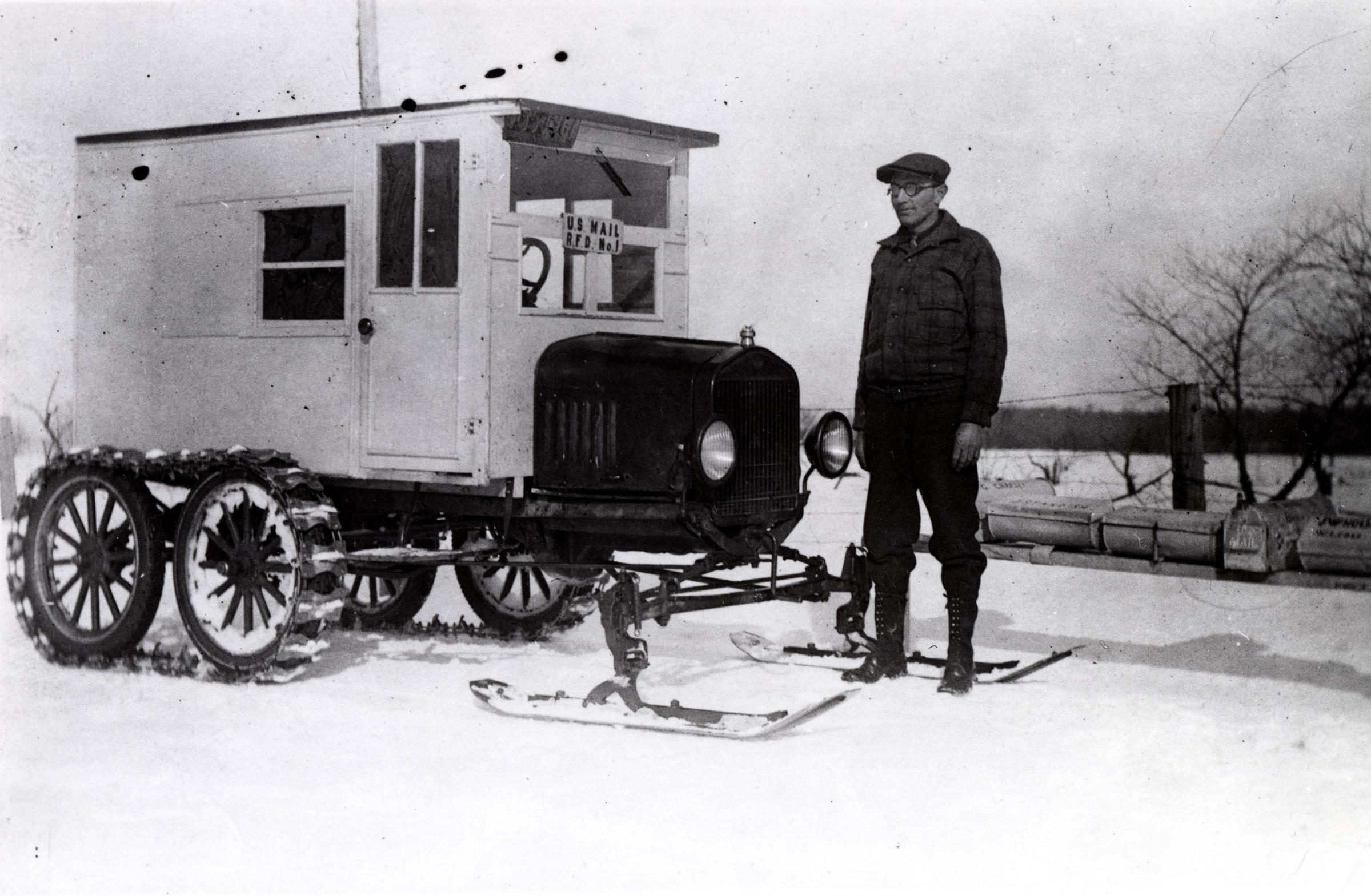 Rural carrier Lloyd Mortice created this unusual vehicle for use on his snow-bound New England route. Mortice fitted his 1926 Model-T with a steel track on the rear drive shaft, enabling him to drop either wheels or skis into place in front, depending on weather conditions. The company that sold Mortice the steel track later produced a similar vehicle based on the carrier's idea. 1926.