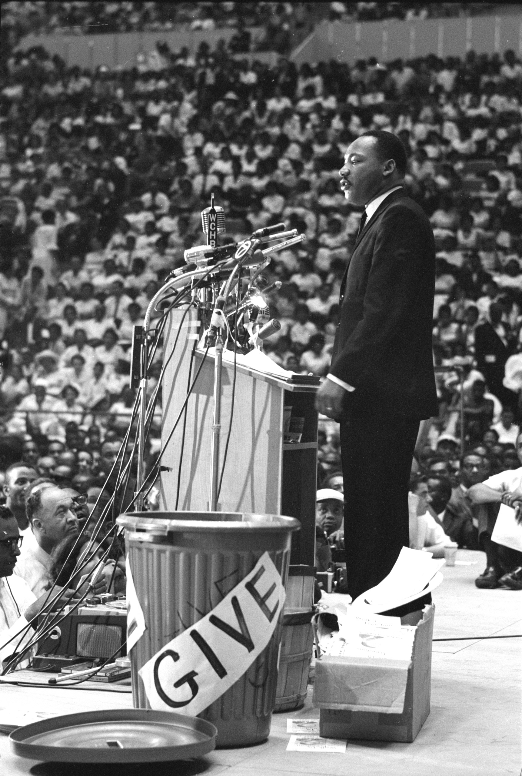 Reverend Martin Luther King Jr. addressing rally in Detroit, 1963.