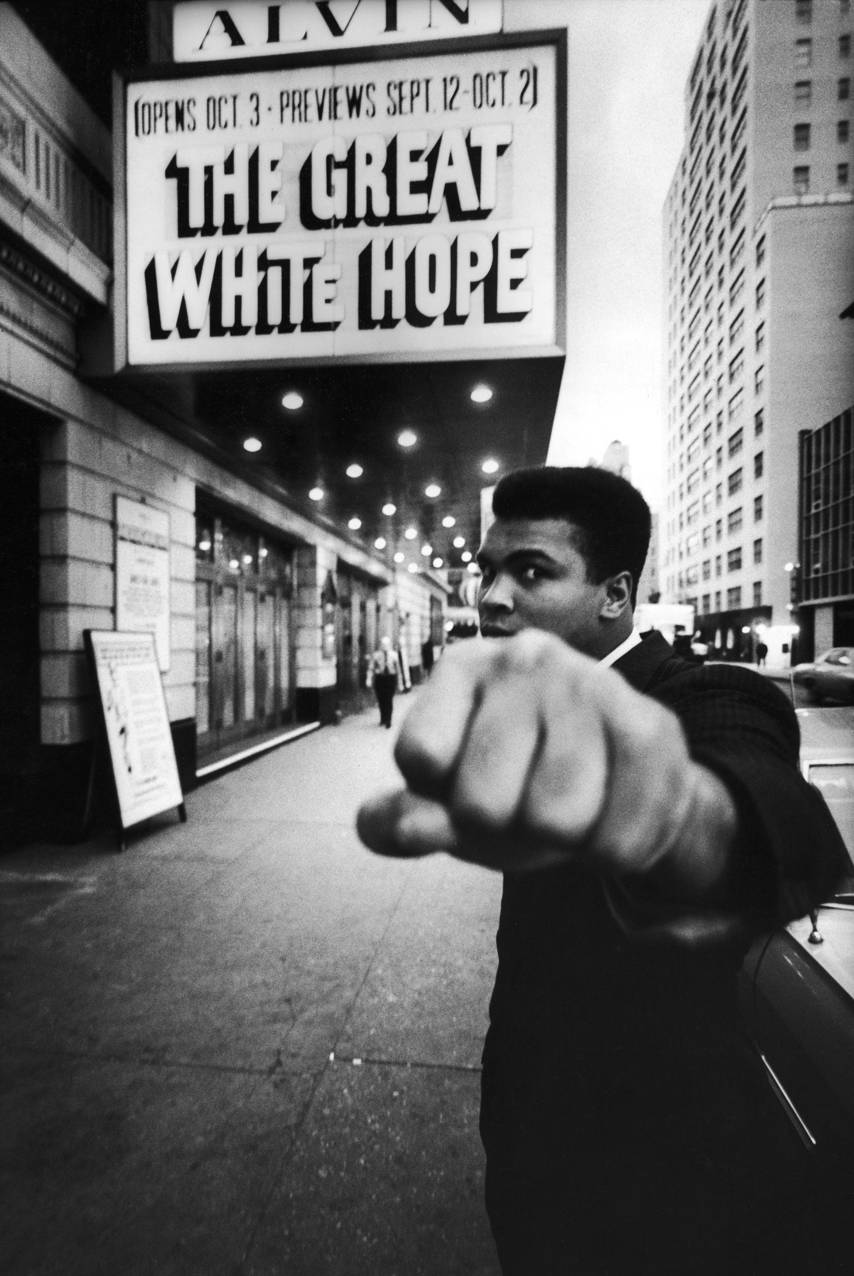 Muhammad Ali, posing outside the Alvin theater where "The Great White Hope" is playing, 1968.
