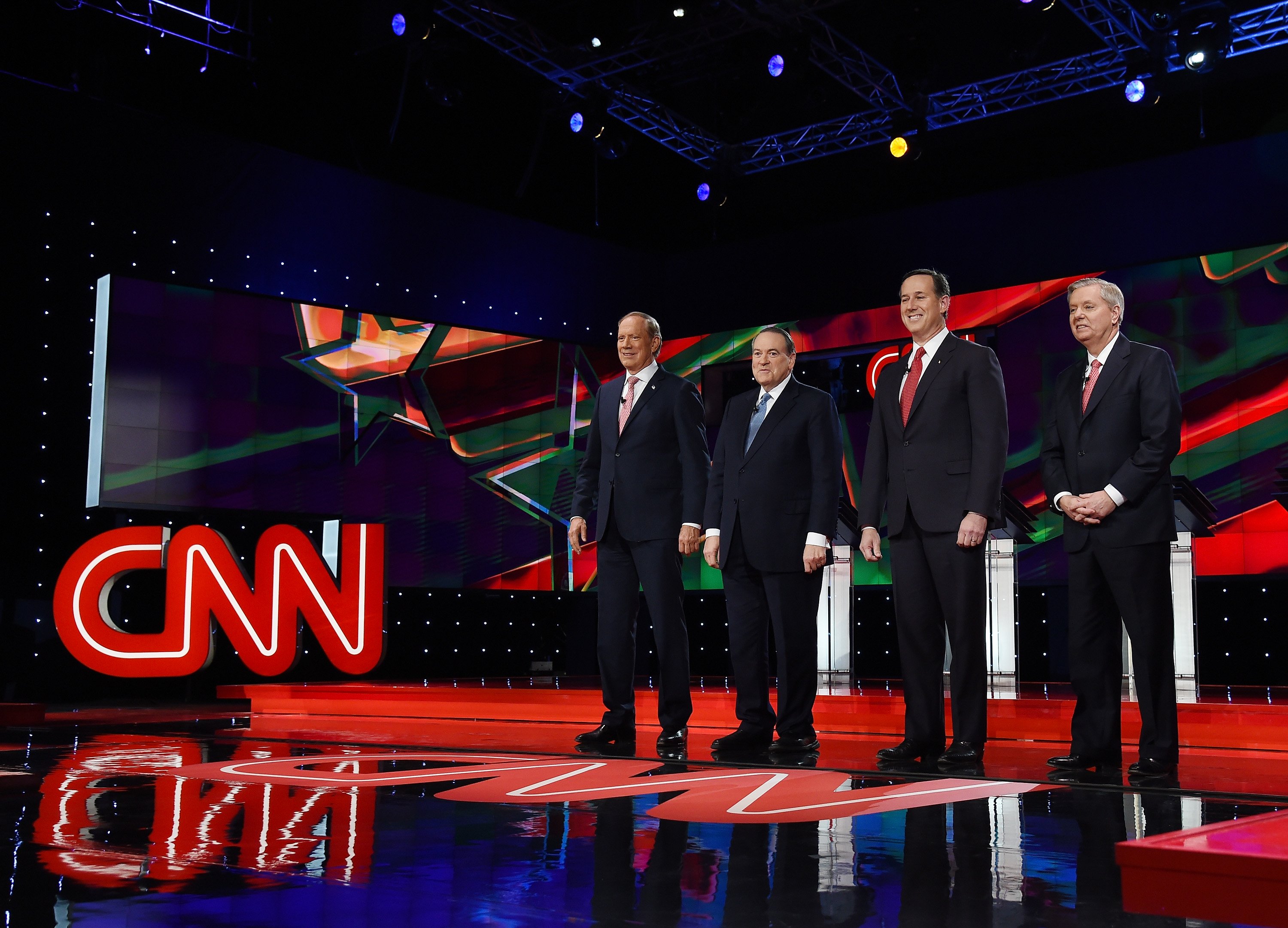 George Pataki, Mike Huckabee, Rick Santorum and Sen. Lindsay Graham are introduced during the CNN presidential debate at The Venetian in Las Vegas, Nevada on Dec. 15, 2015. (Ethan Miller—Getty Images)