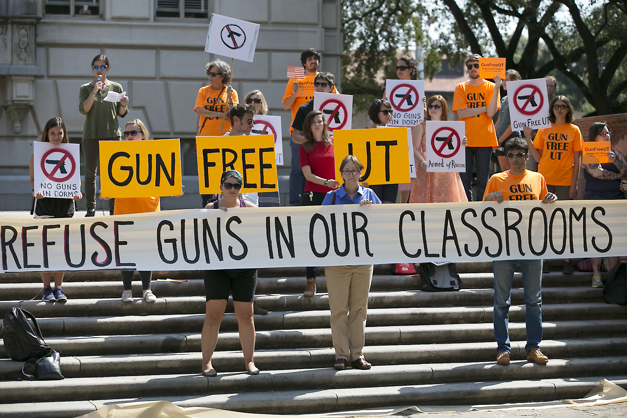 Protestors gathered on the West Mall of the University of Texas campus to oppose a new open carry law, Oct. 1, 2015. Gun rights activist plan on holding a mock mass shooting on the University of Texas campus. (Ralph Barrera—AP)