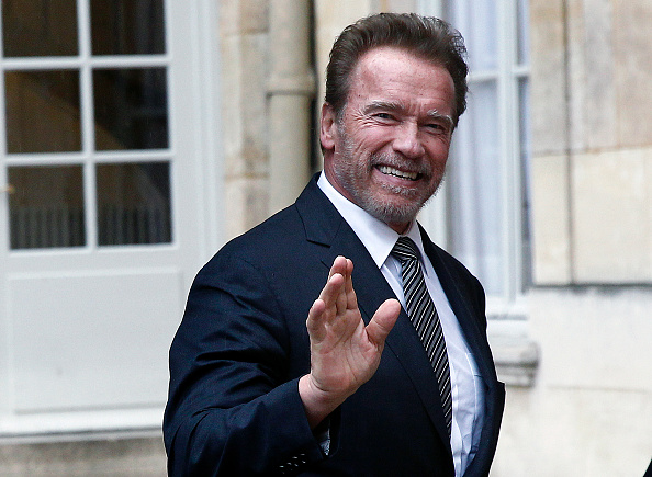 Former California governor and US actor Arnold Schwarzenegger arrives at the Hotel Matignon prior to attend a meeting with French Prime minister Manuel Valls on December 08, 2015 in Paris, France.