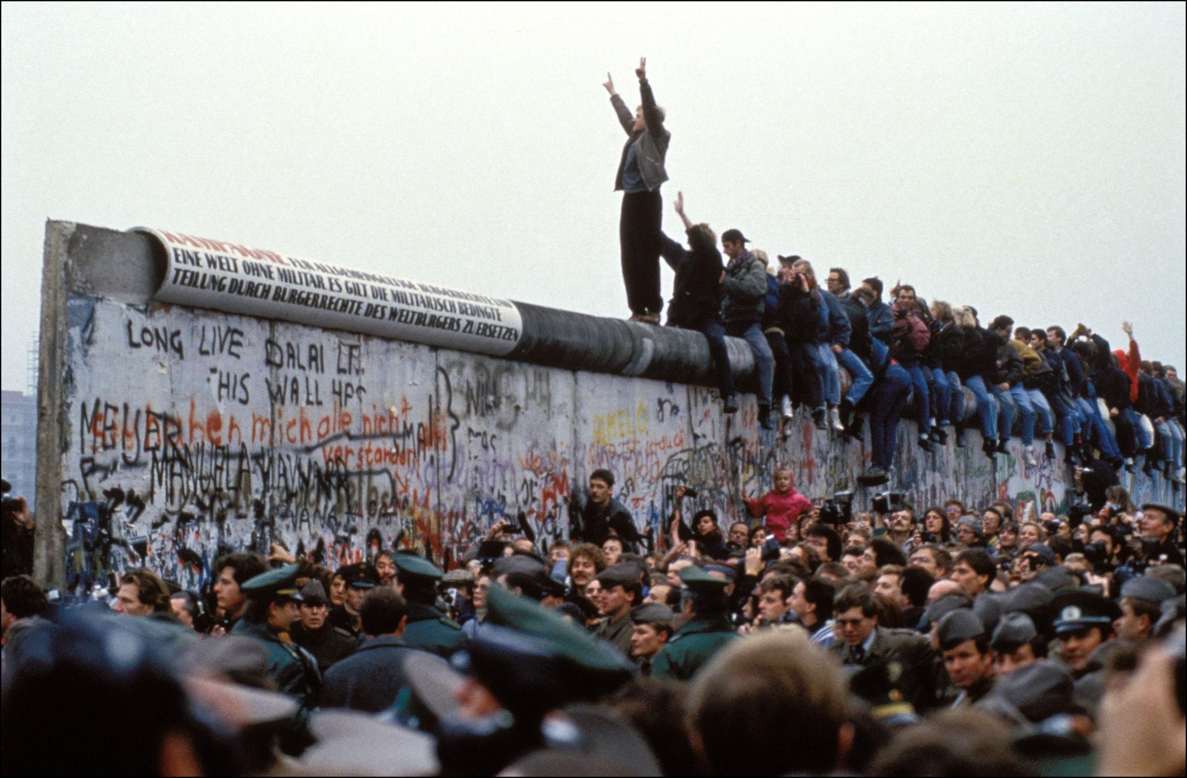 People celebrate on the Berlin wall on Nov. 12, 1989.