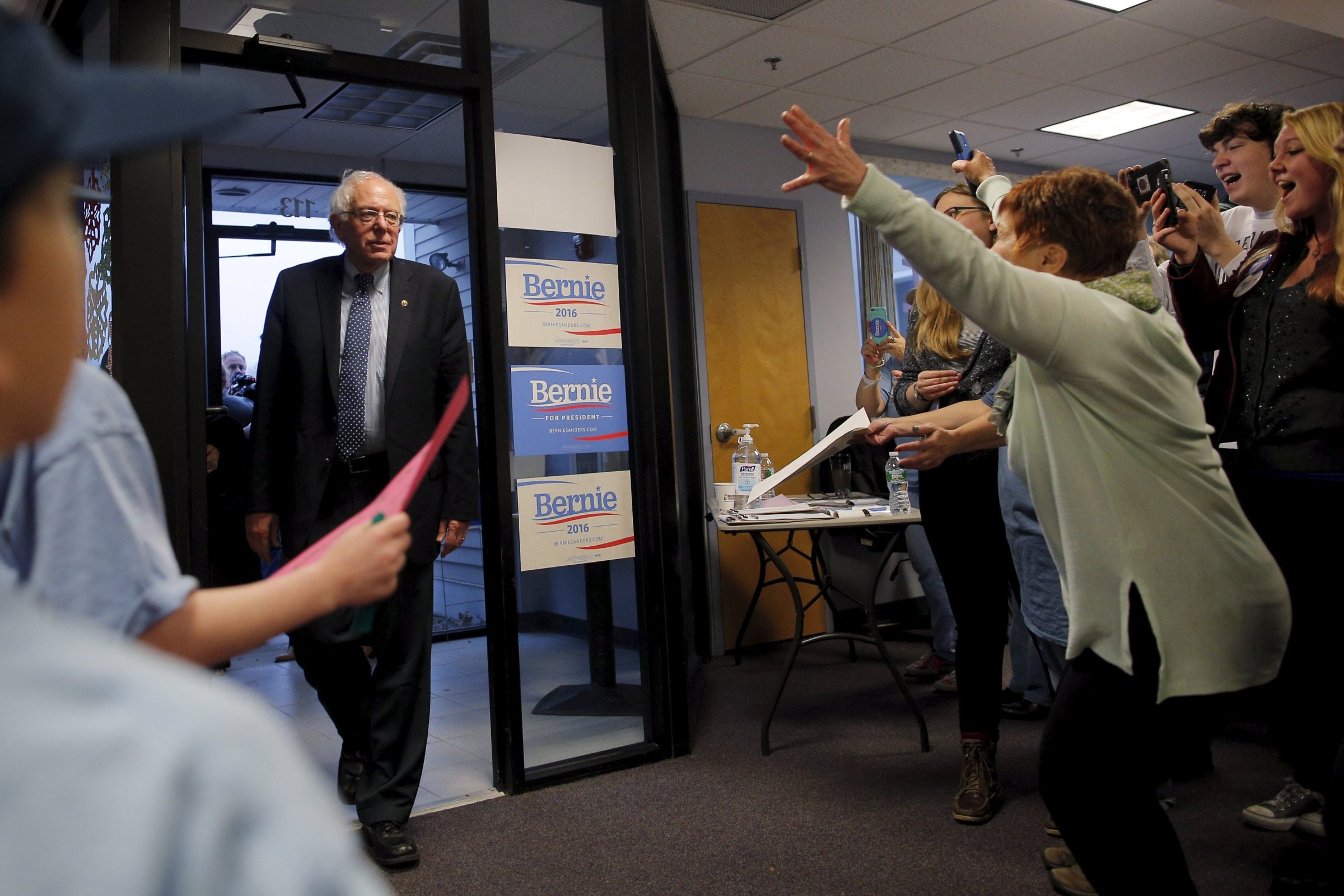 Supporters welcome U.S. Democratic presidential candidate and U.S. Senator Bernie Sanders as they open a new regional campaign field office in Salem