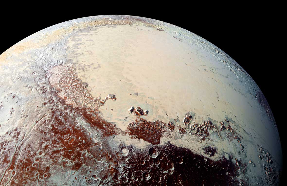This high-resolution image captured by NASA’s New Horizons spacecraft combines blue, red and infrared images taken by the Ralph/Multispectral Visual Imaging Camera (MVIC). Pluto’s surface shows a remarkable range of subtle colors, enhanced in this view to a rainbow of pale blues, yellows, oranges, and deep reds. The bright expanse is the western lobe of the “heart,” informally known as Tombaugh Regio. The lobe, informally called Sputnik Planum, has been found to be rich in nitrogen, carbon monoxide, and methane ices.Credit: NASA/JHUAPL/SwRIView Image FeatureLast Updated: Oct. 15, 2015Editor: Tricia Talbert
