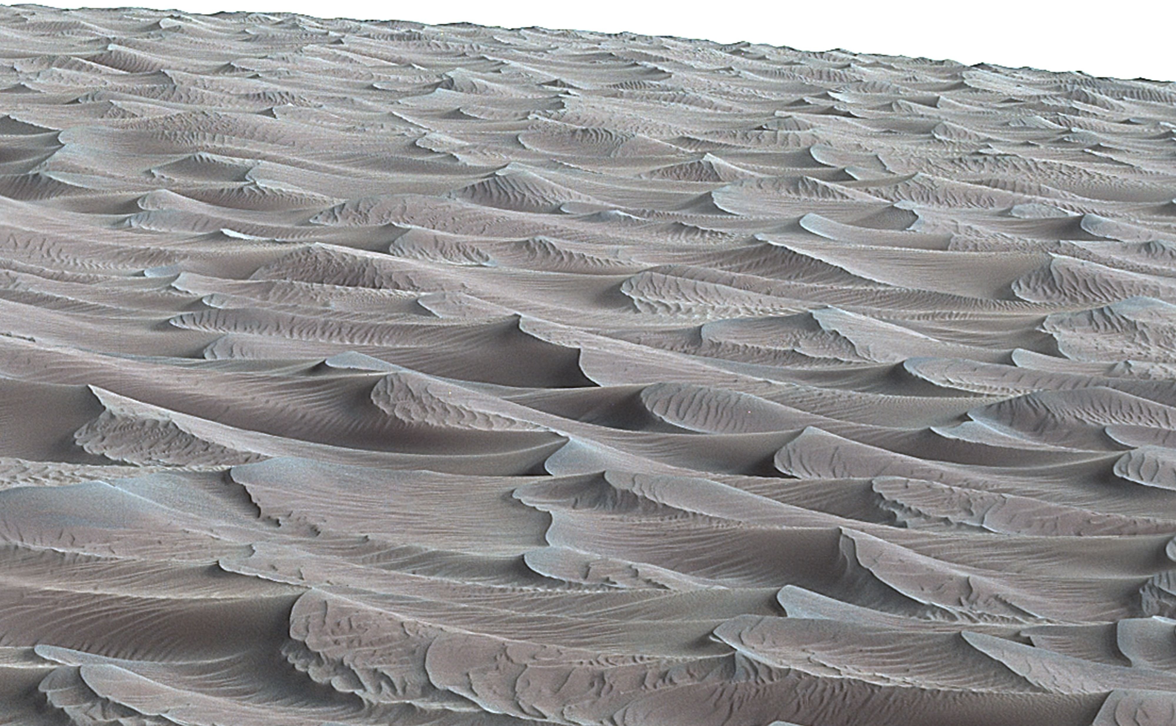 The rippled surface of the first Martian sand dune ever studied up close can been seen is this photo taken on Nov. 27, 2015 by NASA Mars Rover Curiosity.  The dunes close to Curiosity's current location are part of  Bagnold Dunes,  a band along the northwestern flank of Mount Sharp inside the Gale Crater.