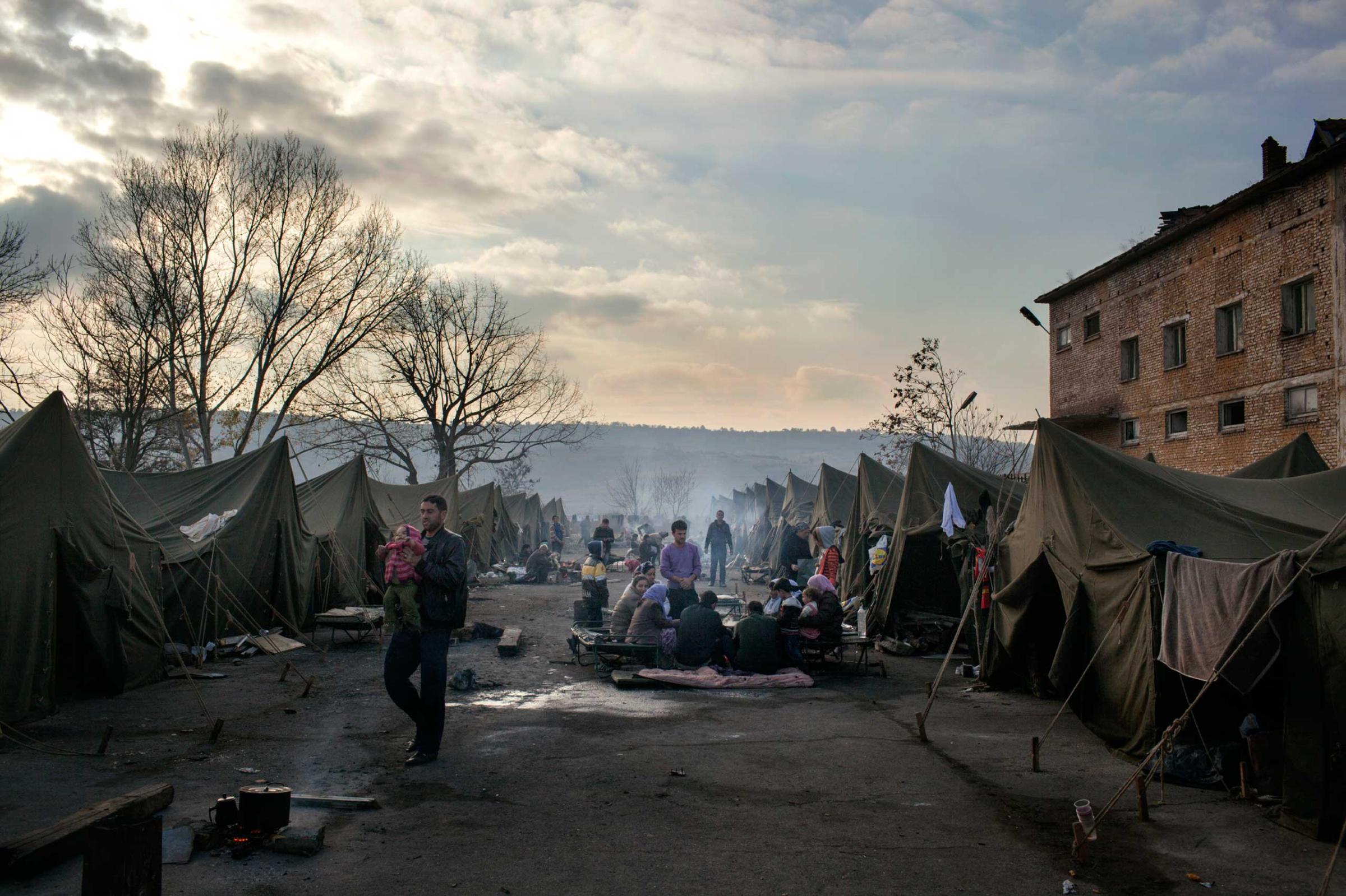 A camp for Syrian refugees in Harmanli, Bulgaria near the Turkish border, where approximately 1,000 asylum-seekers were housed on a former military base in tents, containers and a dilapidated building. The tents were not heated and the occupants slept either on thin mattresses or on old foldable beds, with four toilets serving the whole camp. Harmanli, Bulgaria, Nov. 19, 2013.