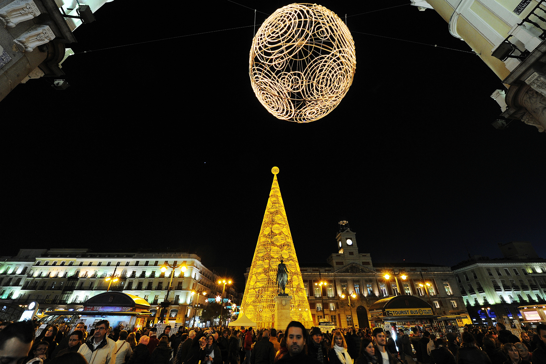 An artificial Christmas tree illuminates Puerta del Sol square in Madrid,  on Nov. 29, 2015.