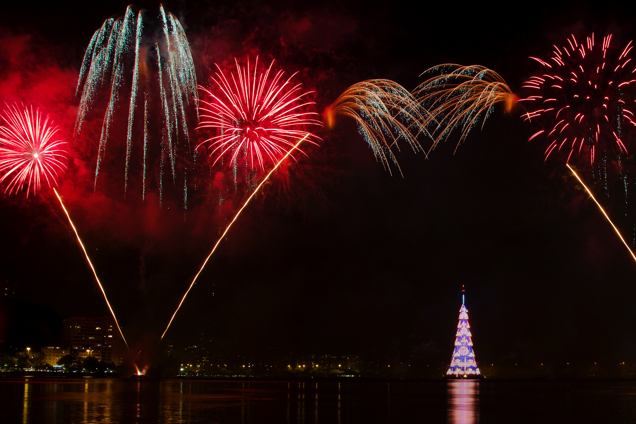 Fireworks explode over the floating Christmas tree at the Rodrigo de Freitas Lagoon in Rio de Janeiro on Dec. 12, 2015.