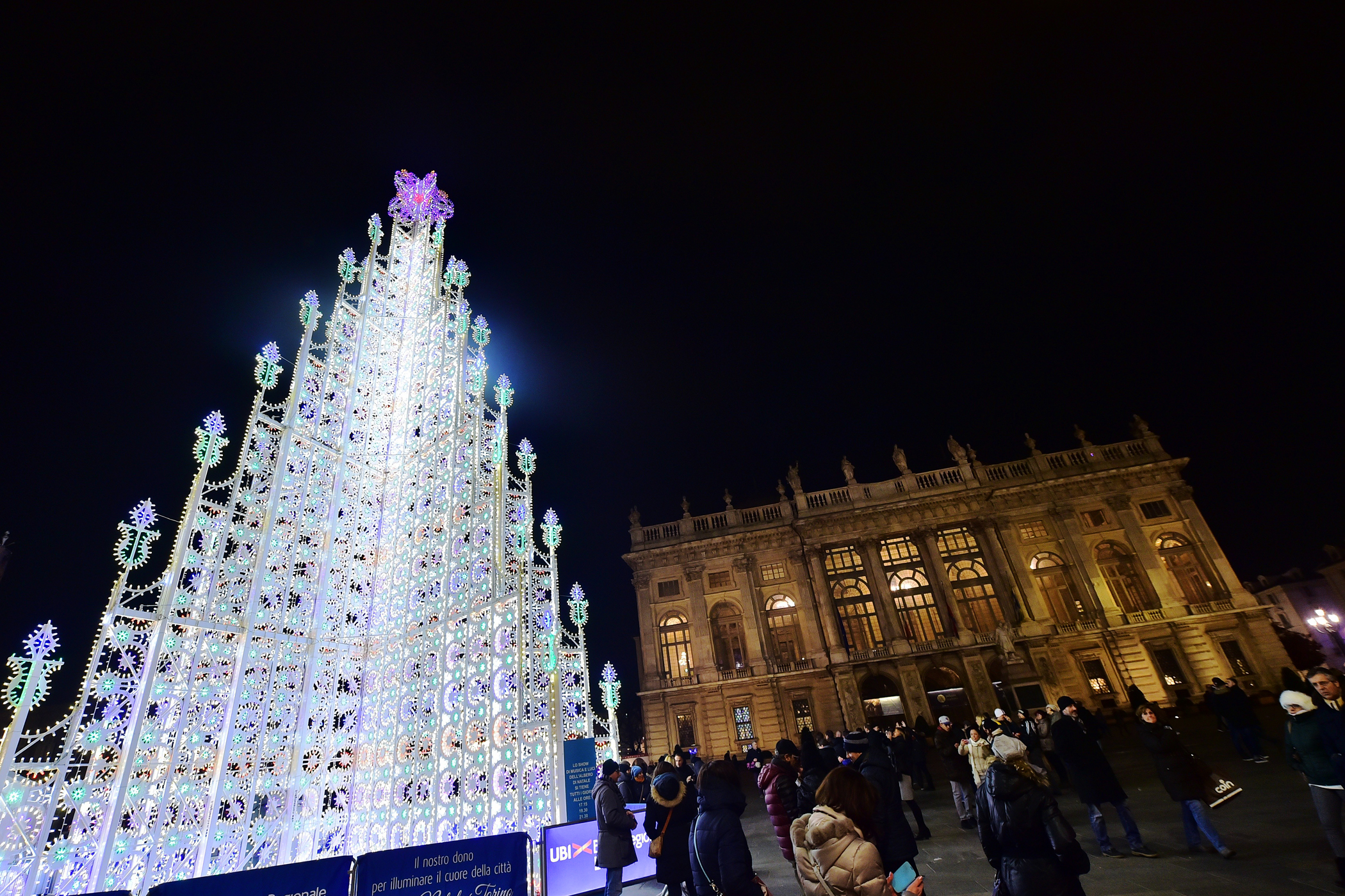 A light installation shaped as a christmas tree is displayed on Piazza Castello in Turin on Dec. 12, 2015.