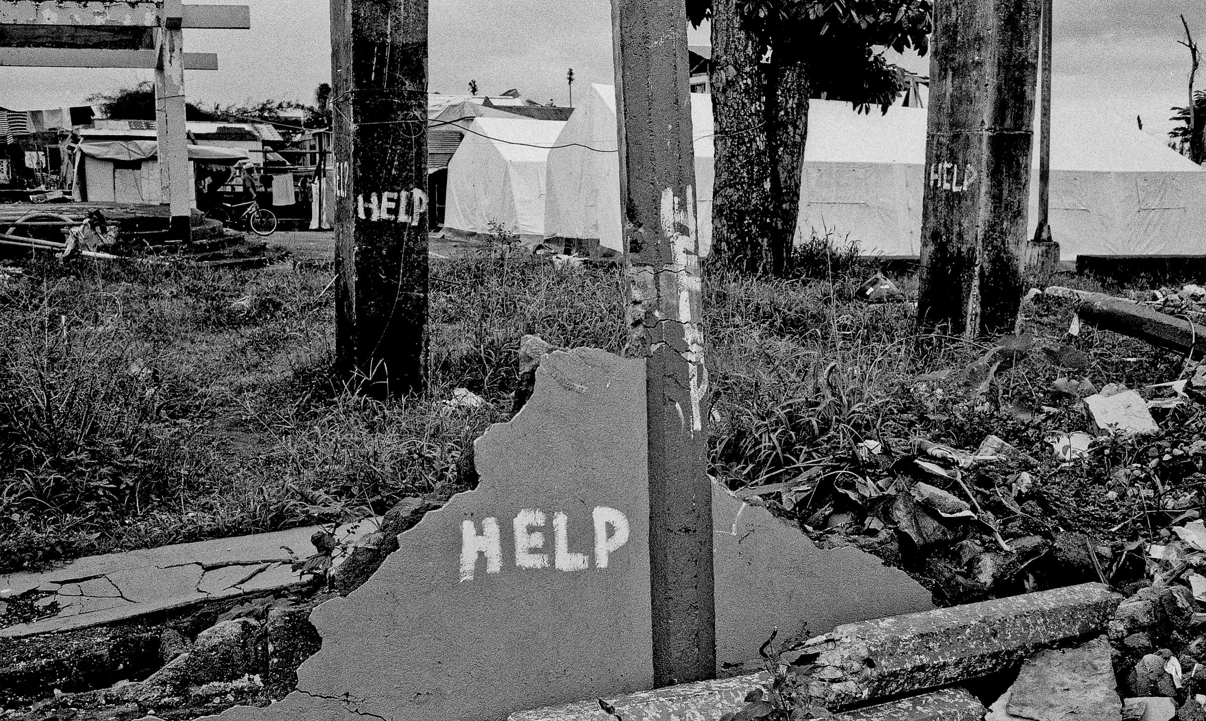 A call for help is painted on pillars in San Joaquin, Feb. 15, 2014.