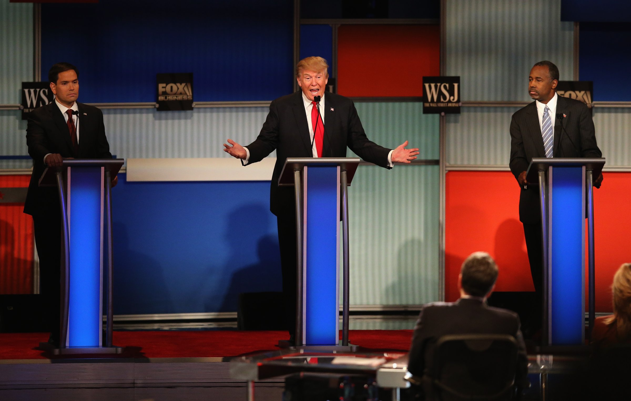 Presidential candidate Donald Trump (C) speaks while Sen. Marco Rubio (L) (R-FL), and Ben Carson look on during the Republican Presidential Debate sponsored by Fox Business and the Wall Street Journal in Milwaukee, Wisc., on Nov. 10, 2015.