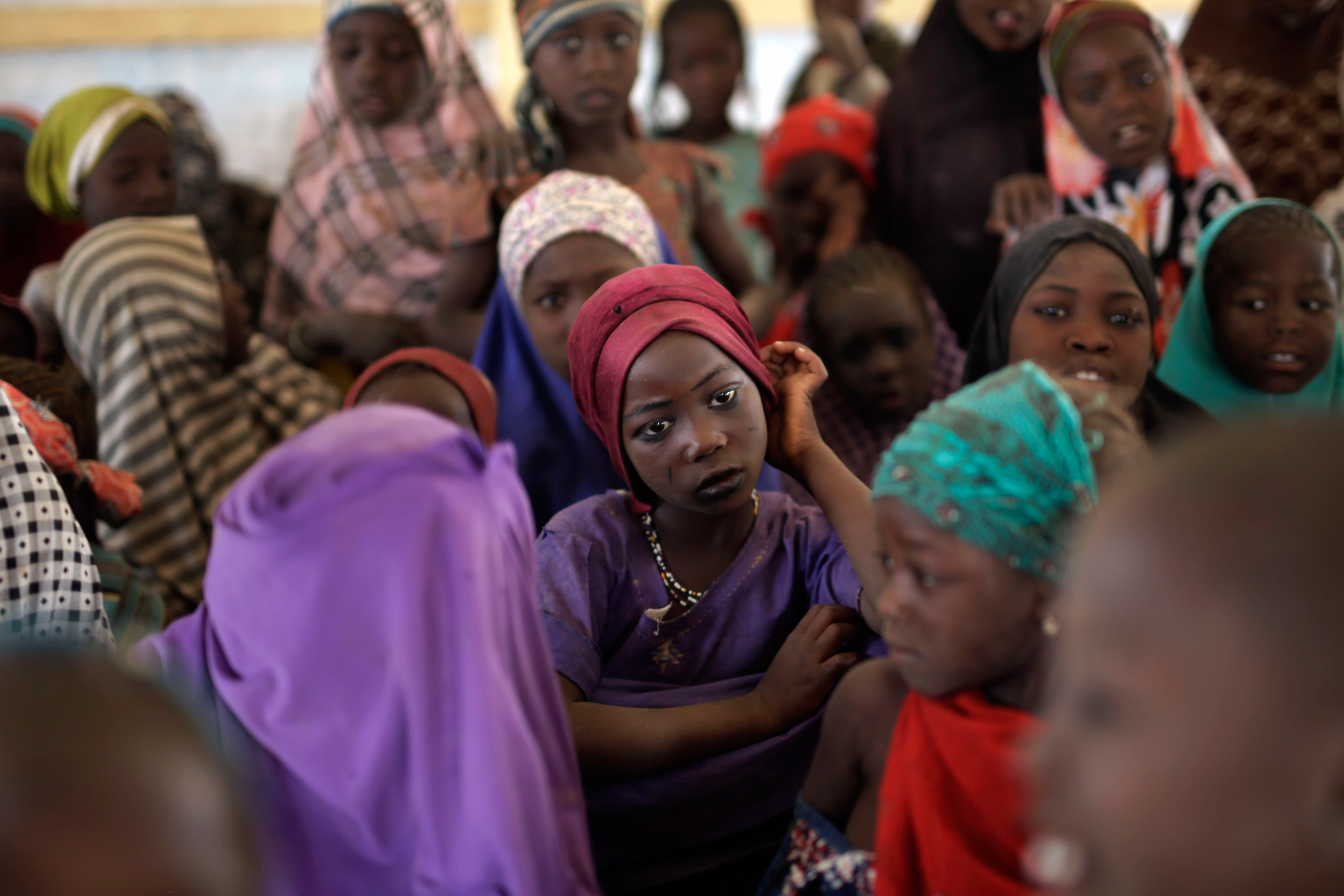 Nigerian girls who fled Boko Haram to Chad gather in a school set up by UNICEF at the Baga Solo refugee camp in Chad on March 4, 2015. (Jerome Delay—AP)