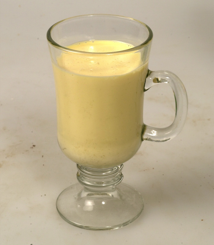 A glass of eggnog.