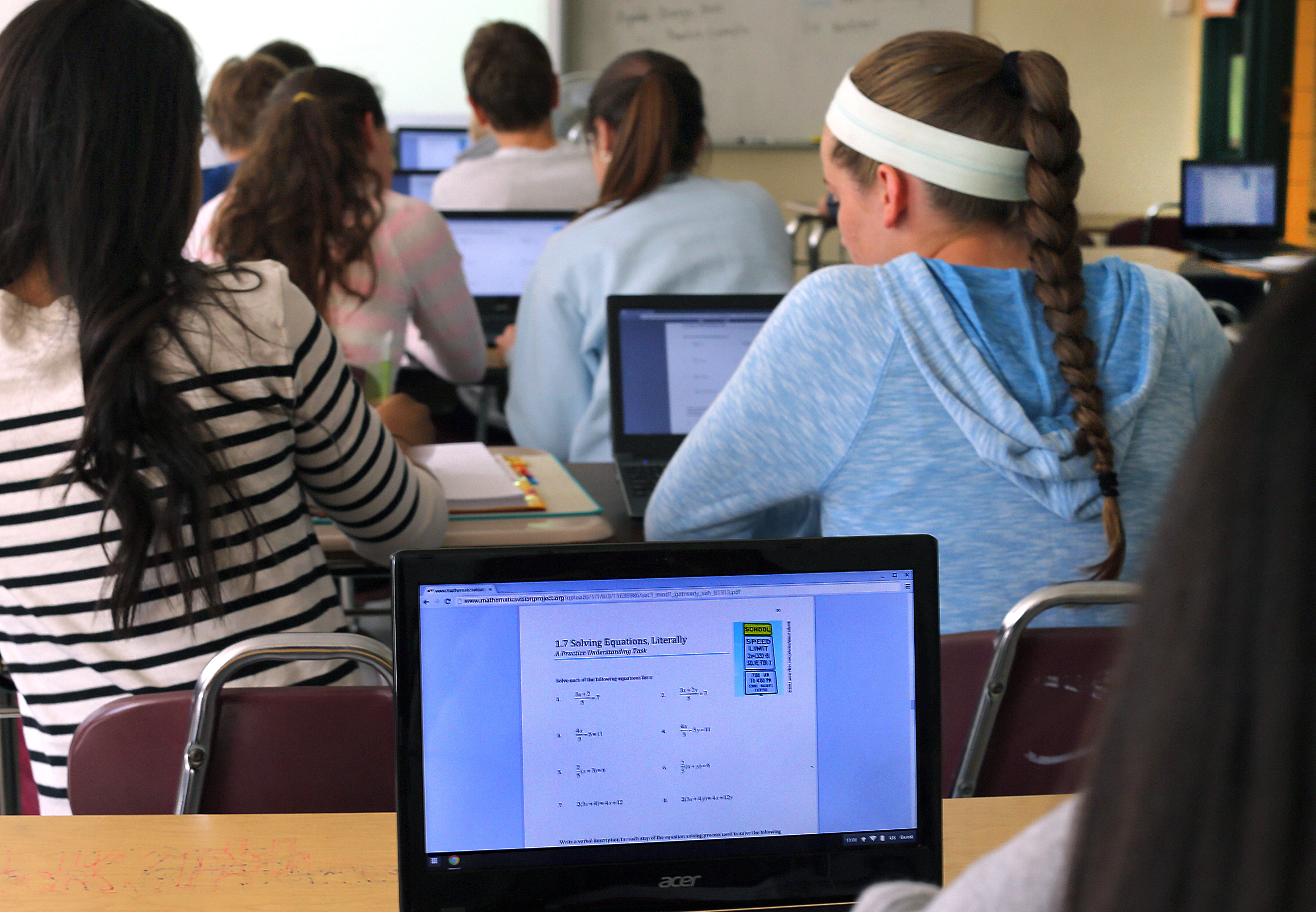 Students work on a math equation using Chromebooks Sept. 17, 2014. (John Tlumacki—Boston Globe/Getty Images)