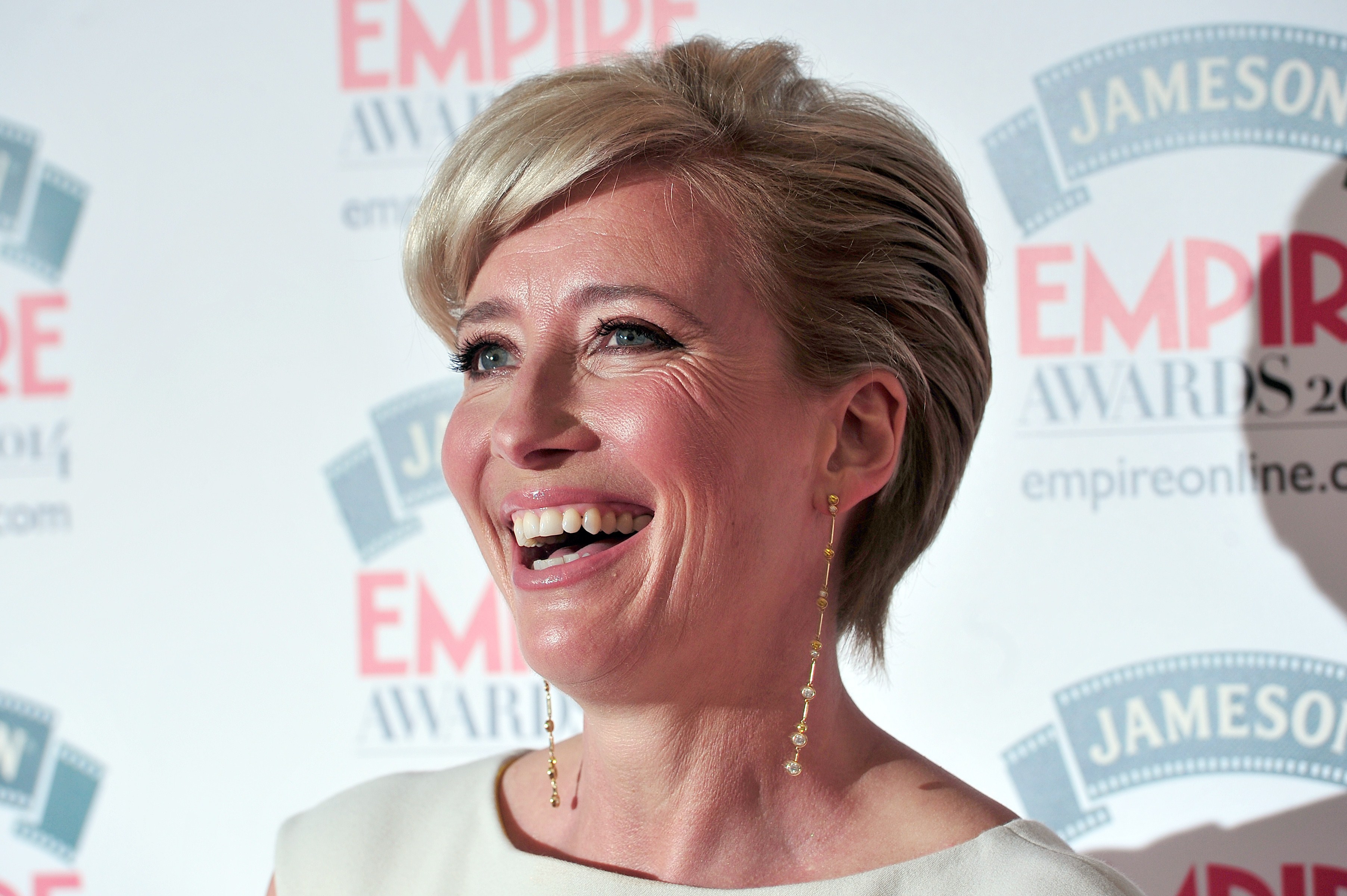British actress Emma Thompson poses for pictures as she arrives for the 2014 Empire Awards in central London on March 30, 2014. (Carl Court—AFP/Getty Images)