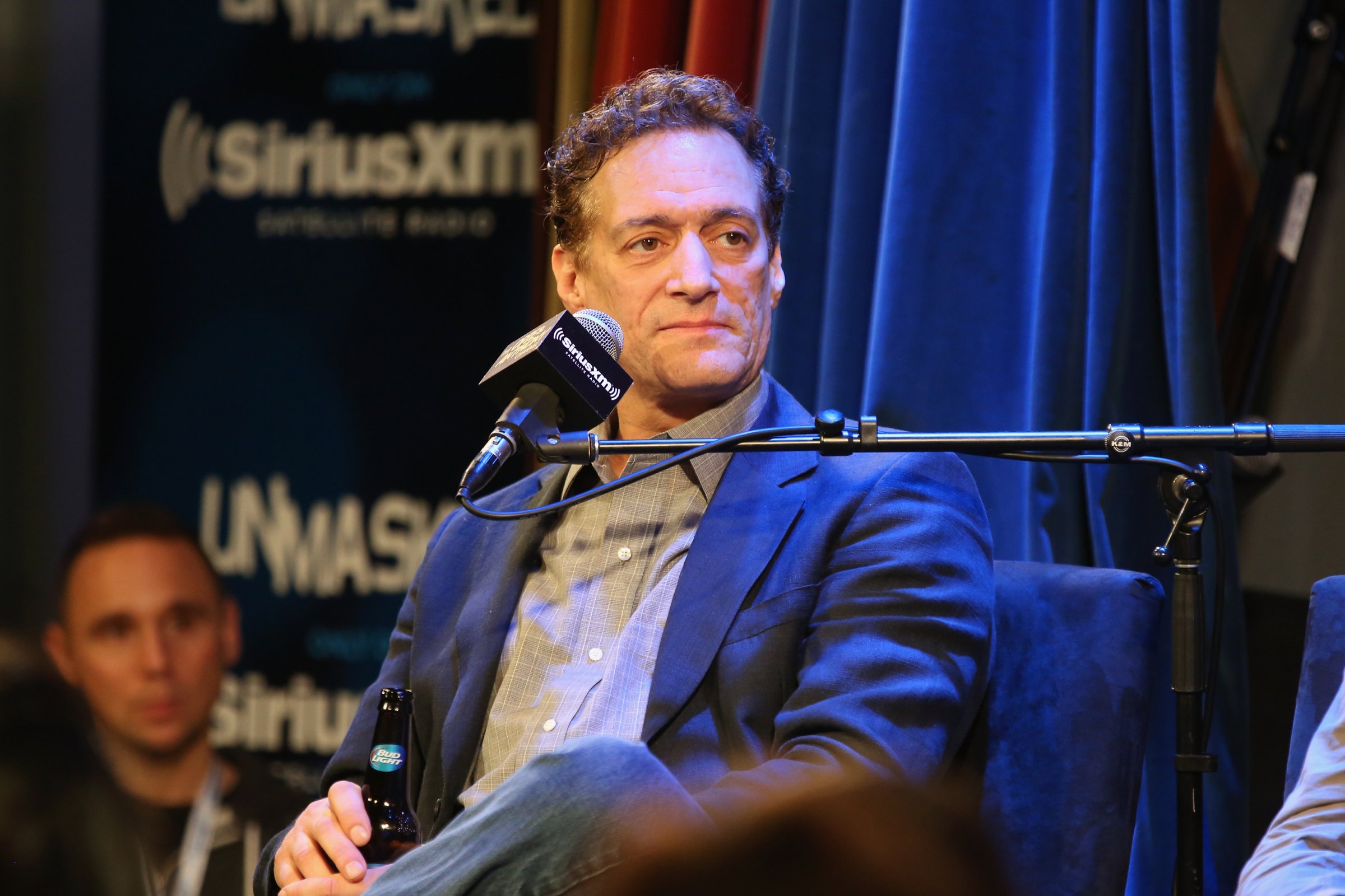 Anthony Cumia, 54, is accused of assaulting a 26-year-old woman in his New York home, police said.
