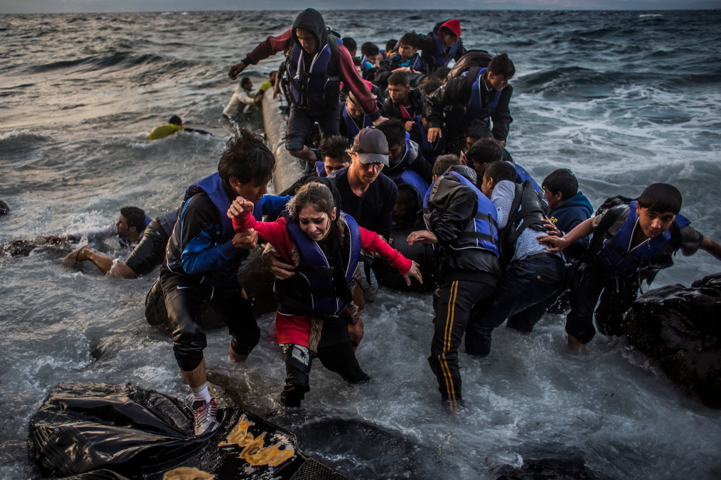 Migrants Arrive On The Beaches Of Lesbos Having Made The Crossing From Turkey