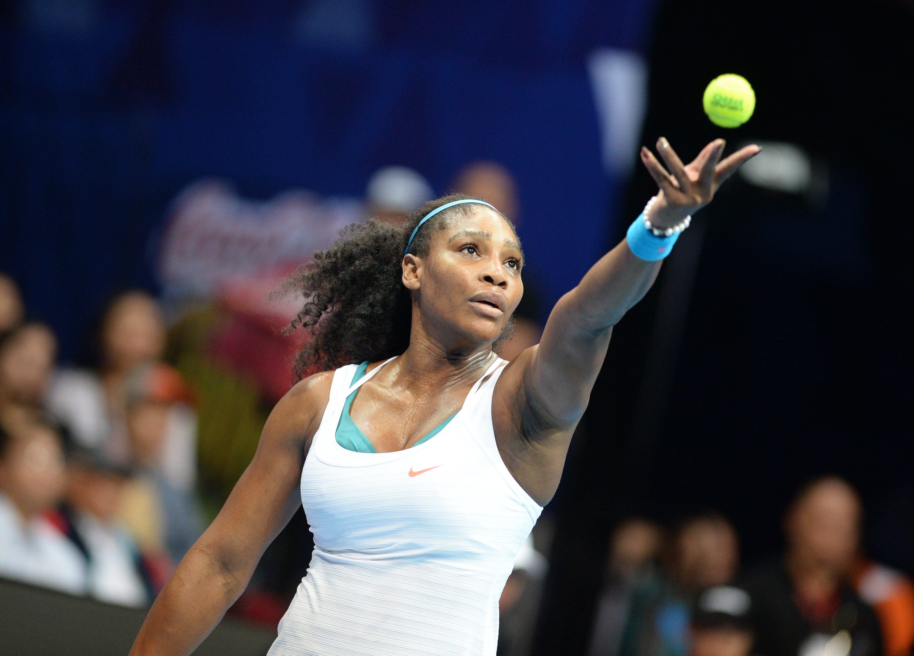 US tennis player Serena Williams  of the Philippine Mavericks serves against Australias Samantha Stosur of the Indian Aces in the women's singles of the International Premier Tennis League (IPTL) competition in Manila on December 8, 2015. Williams won 6-3.     AFP PHOTO / TED ALJIBE / AFP / TED ALJIBE        (Photo credit should read TED ALJIBE/AFP/Getty Images) (Ted Aljibe&mdash;AFP/Getty Images)