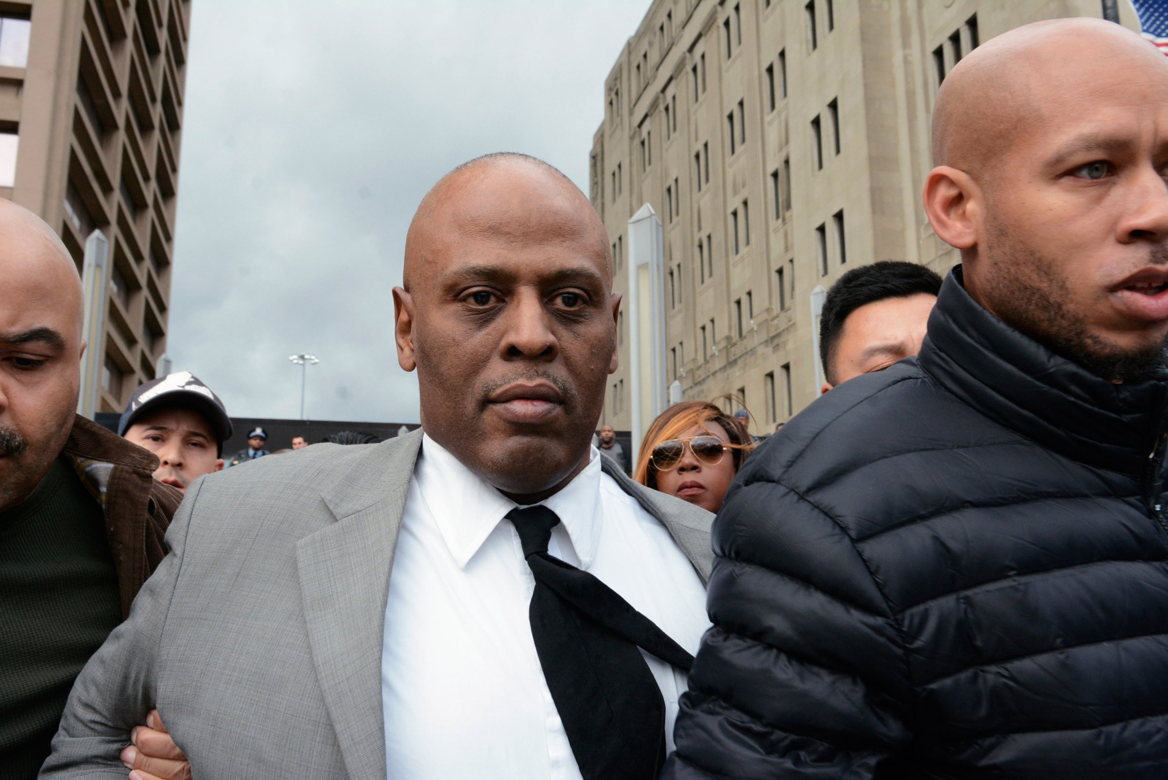 Chicago Police Commander Glenn Evans, who was accused of shoving his gun down a suspect's throat and pressing a stun gun to the man's groin in 2013, leaves the Criminal Courts Building in Chicago on Dec. 14, 2015.