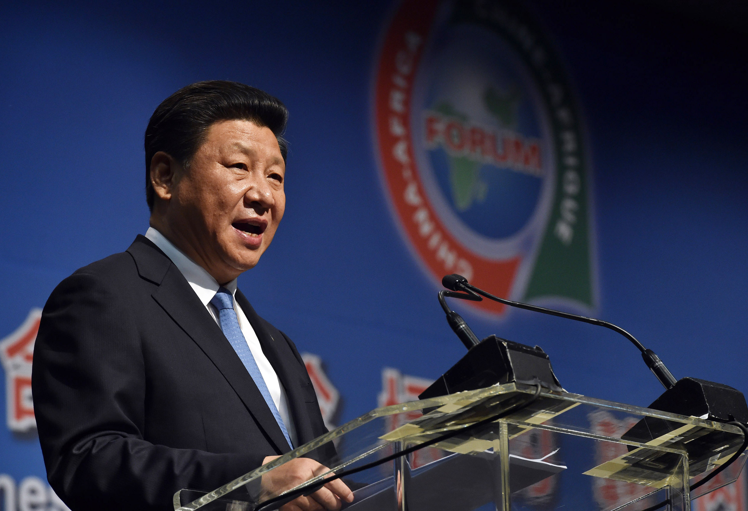 A handout picture provided by the South African Government Communication and Information System (GCIS) shows Chinese President Xi Jinping addressing delegates at the opening of the Forum on China-Africa Co-operation (Focac) Summit in Johannesburg, South Africa, Dec. 2015. (ELMOND JIYANE/GCIS/EPA)