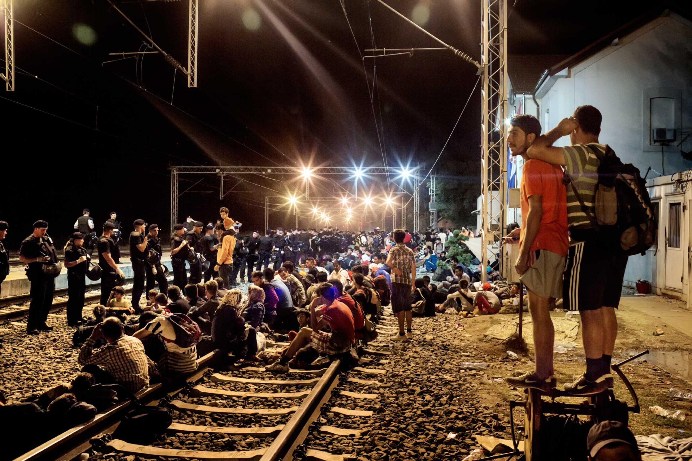 Refugees, asylum seekers and migrants at the train station at the Croatian town of Tovarnik, near the border with Serbia, Sept. 18, 2015. After Hungary closed its border with Serbia on Sept. 15, 2015, the flow of refugees attempting to reach further north in Europe shifted to Croatia.
