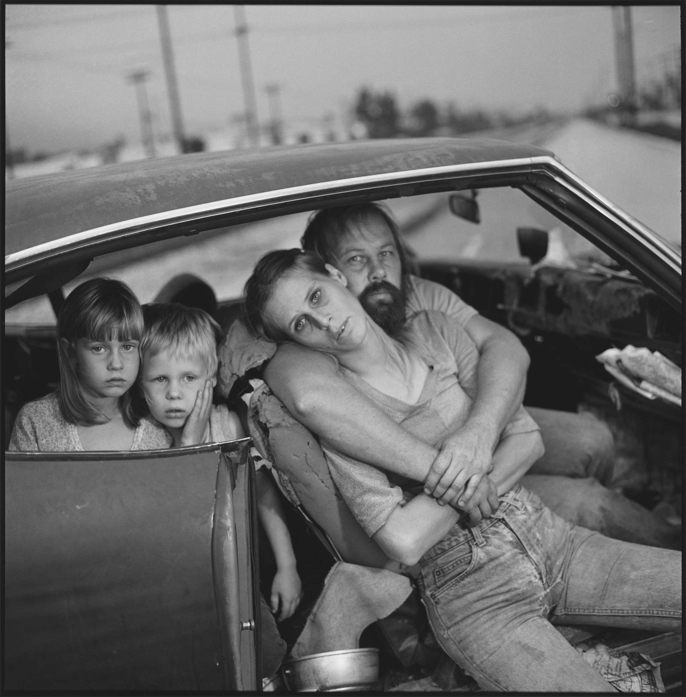 The Damm Family in Their Car, Los Angeles, Calif., 1987.