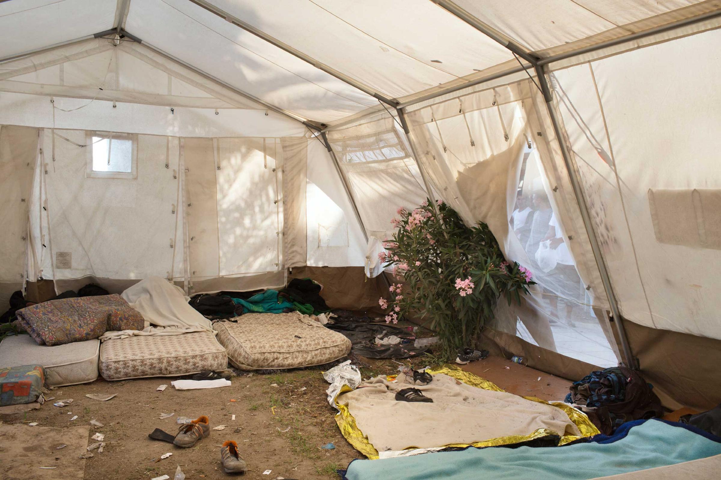 The interior of a tent set up for refugees in the courtyard of an abandoned hotel on the Greek island of Kos, June 8, 2015. Doctors Without Borders' staff worked inside the hotel to improve conditions and provide medical and psychological assistance for the arriving migrants.