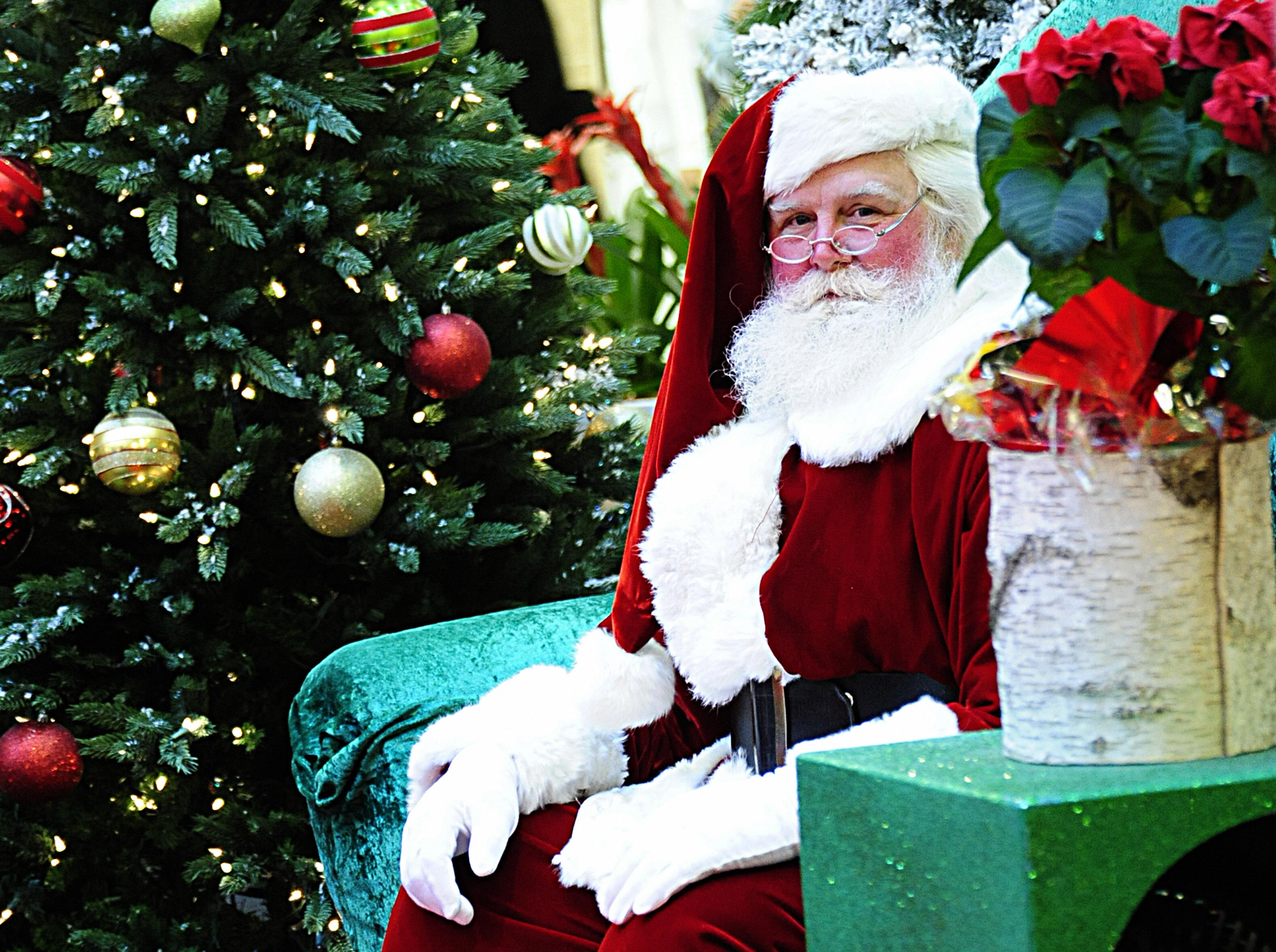 Santa Claus waits to greet children at the Tysons Corner mall in Tysons Corner, Virginia, on Dec. 20, 2008. (Karen Bleier—AFP/Getty Images)