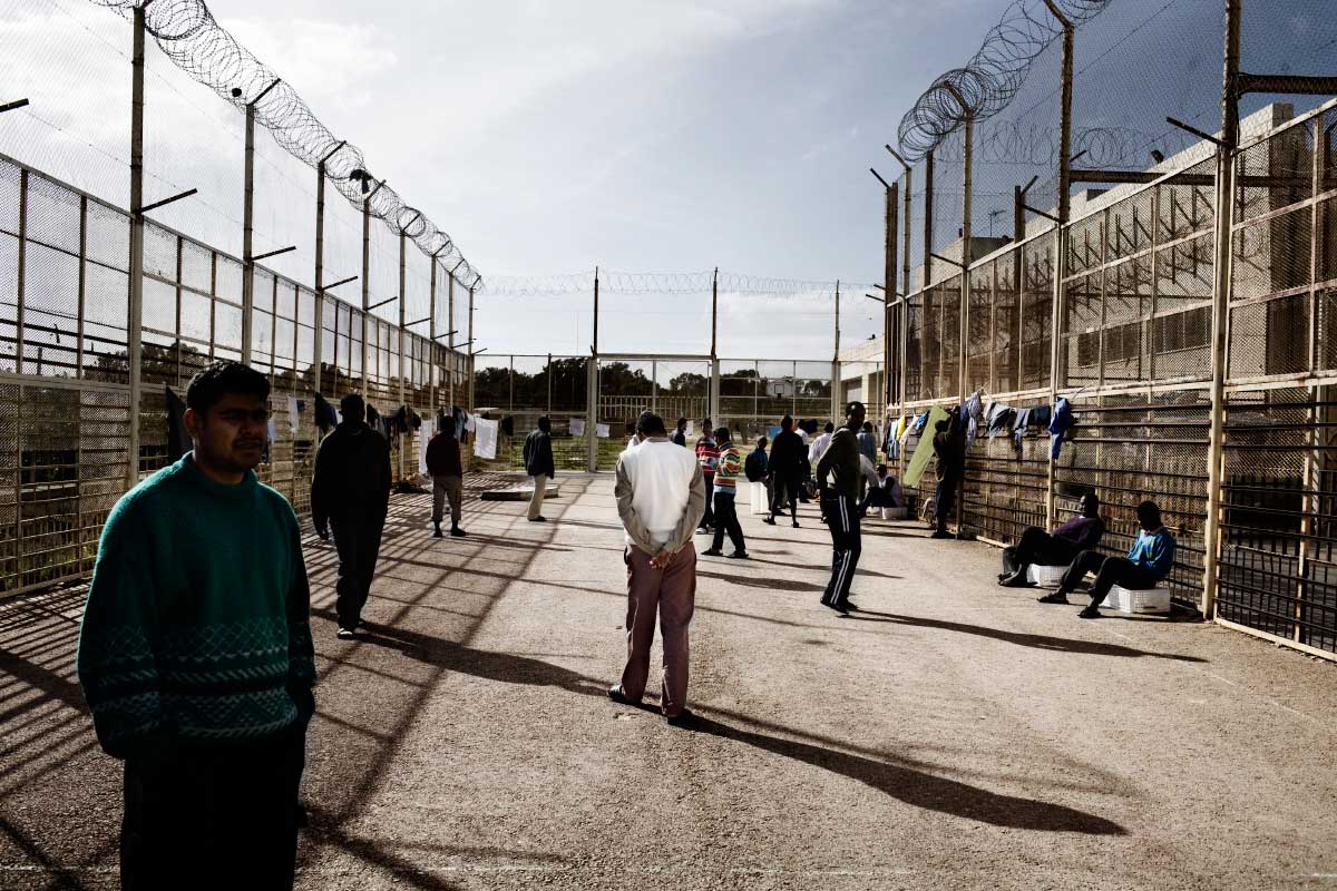 Migrants of different nationalities inside the Safi Barracks Detention Center in the Maltese village of Safi, off the coast of Italy, Dec. 28, 2009.