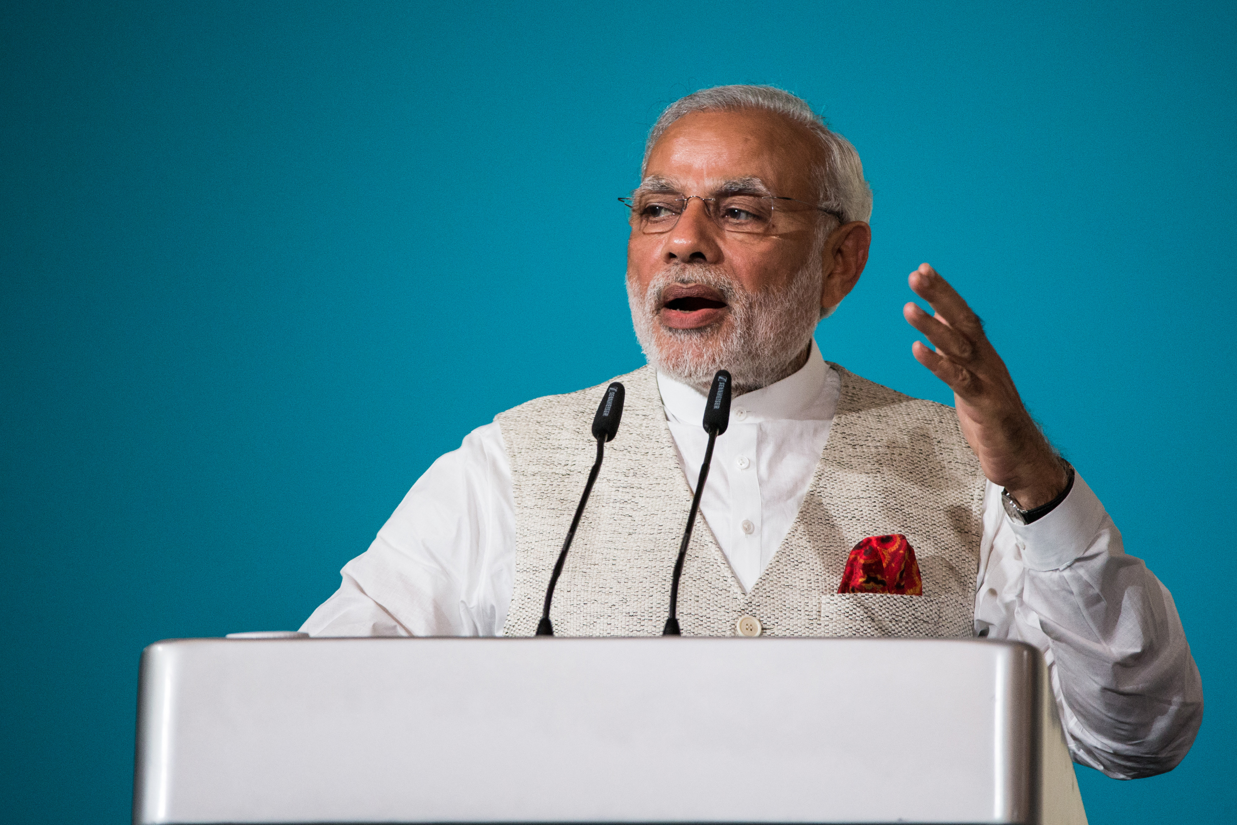 Narendra Modi, India's prime minister, gestures whilst speaking during the 37th Singapore Lecture held at the Shangri-La Hotel in Singapore, on Monday, Nov. 23, 2015. (Nicky Loh–Bloomberg/Getty Images)