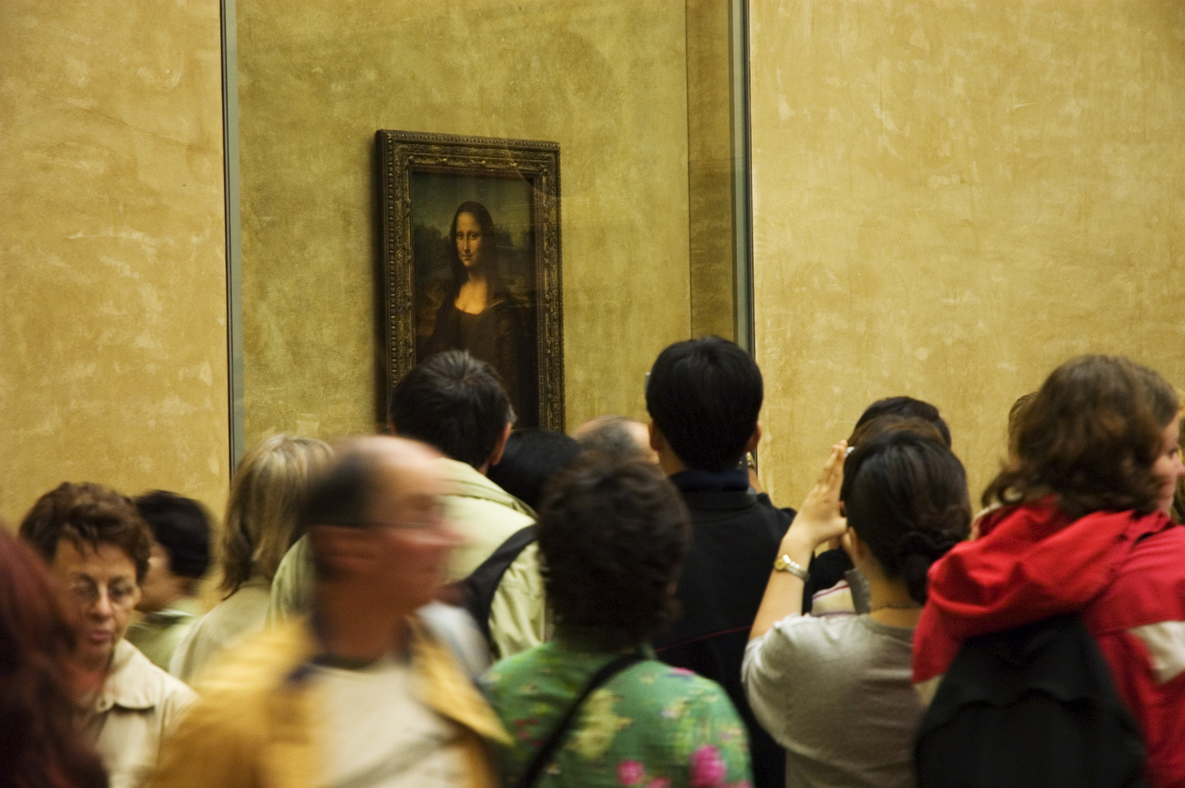 Visitors to the Musee du Louvre lining up see Leonardo Da Vinci's La Joconde, the Mona Lisa. (Glenn Beanland—Getty Images)