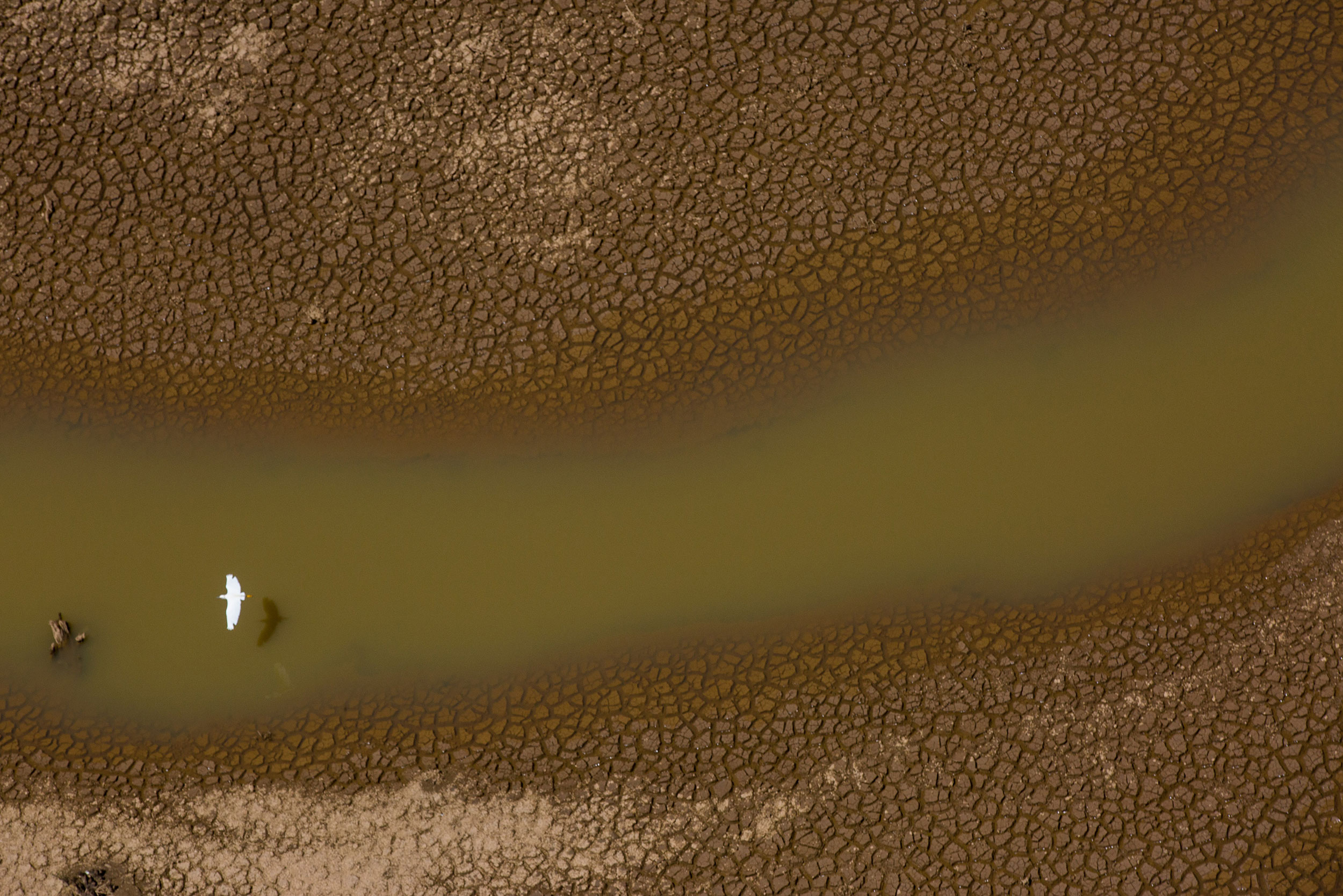 An aerial view of the Atibainha dam, one of the main water reservoirs that supply the State of Sao Paulo, during a drought in Braganca Paulista, Brazil on Feb. 23, 2015.