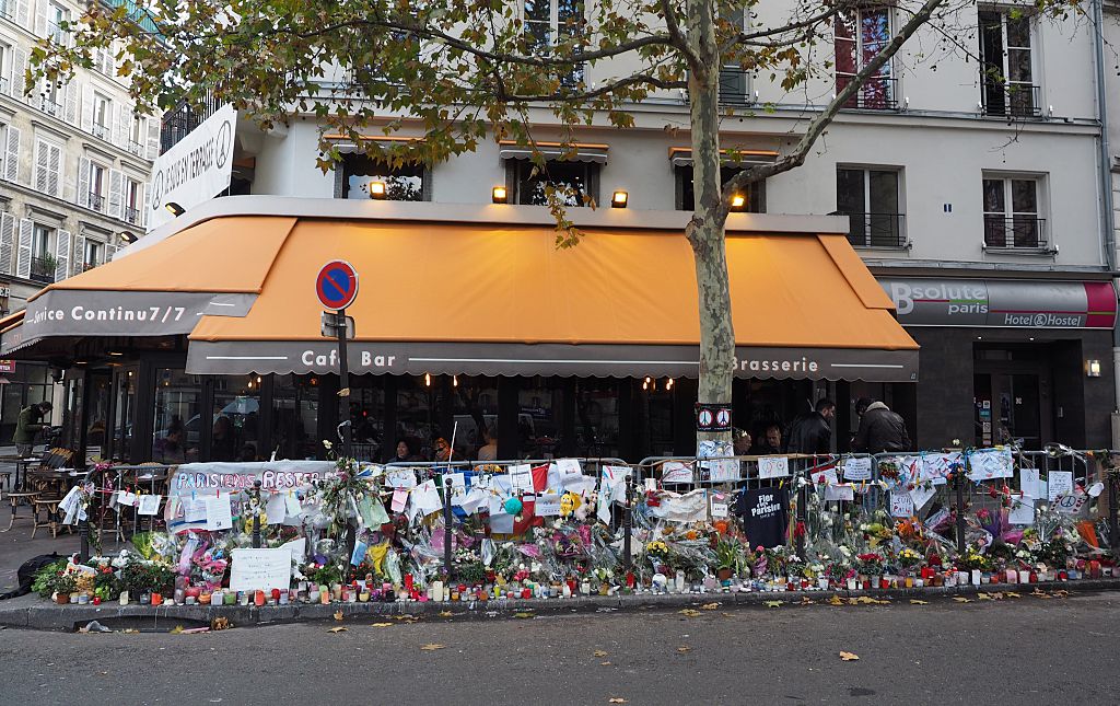 Flowers and notes are seen outside one of the cafes targeted in the Nov. 13 Paris terror attacks. (Anadolu Agency&mdash;Getty Images)