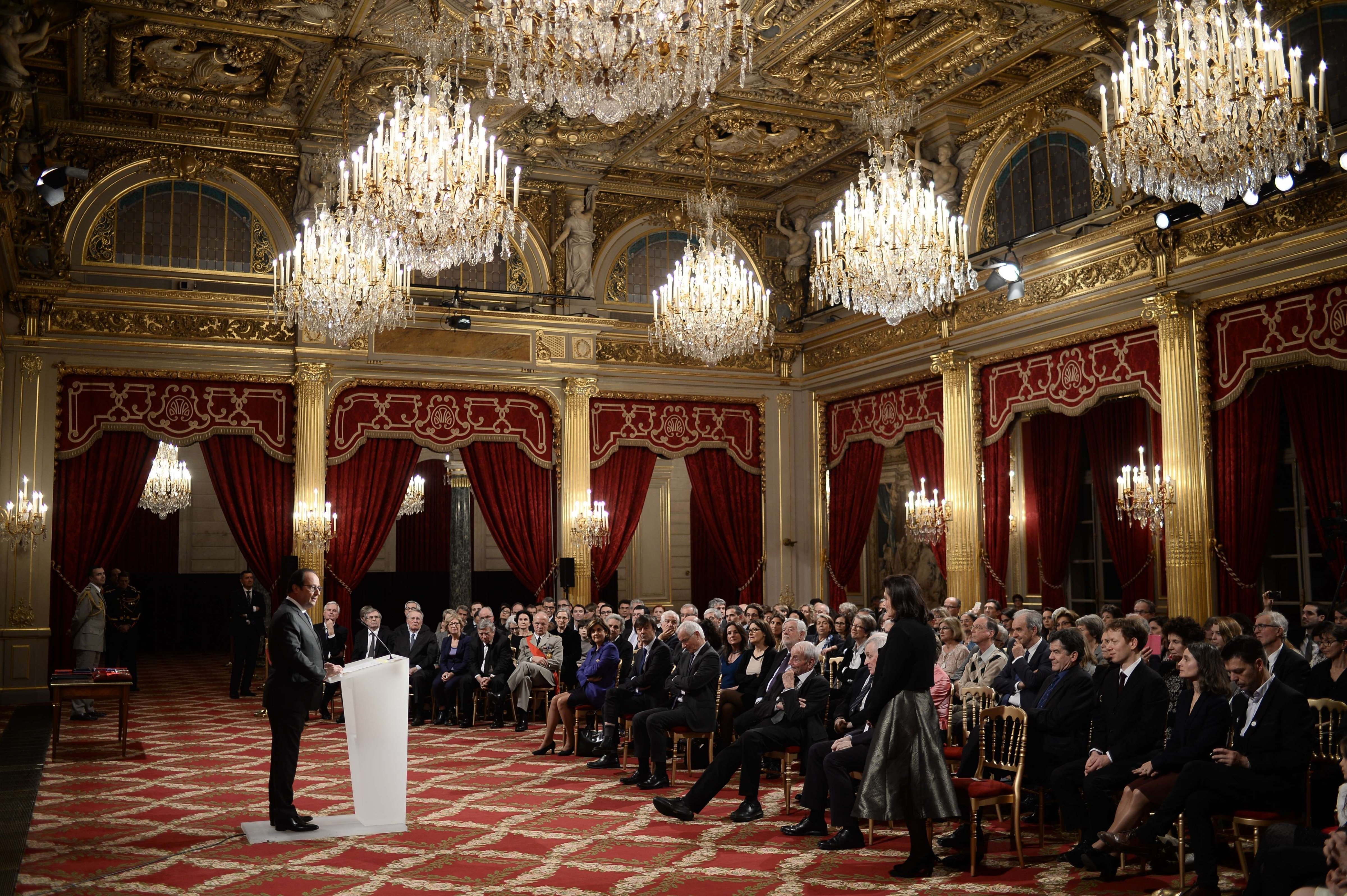 Francois Hollande delivers a speech during a decorations awarding ceremony to personalities committed to the fight against global warming, on Dec. 9, 2015 at the Elysee palace in Paris. (Stephane de Sakutin—AFP/Getty Images)