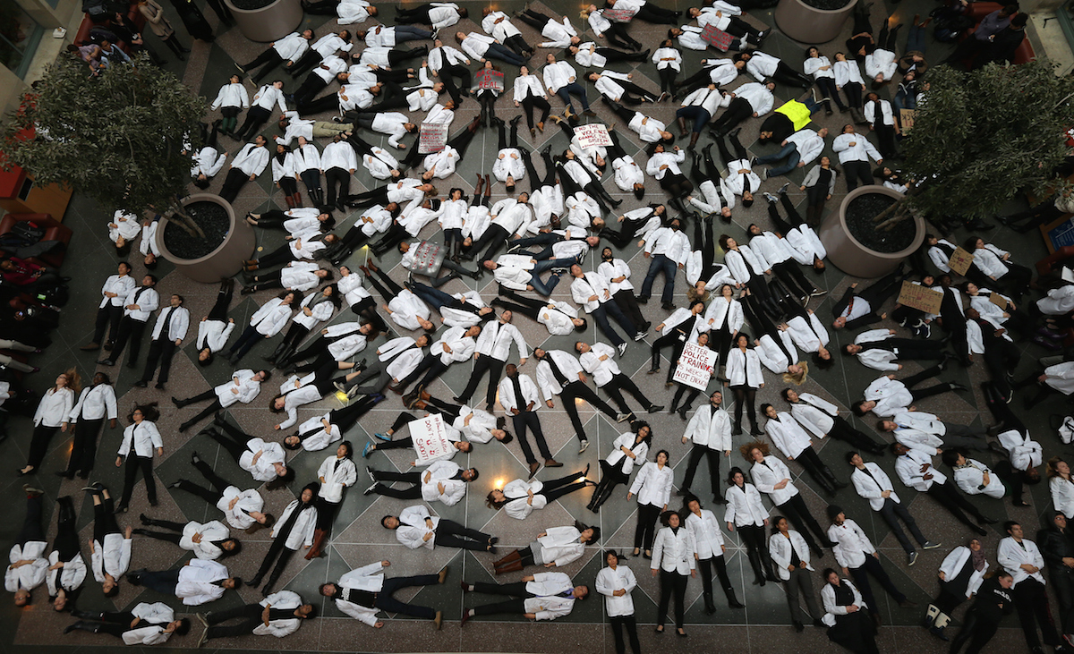 Dec. 10, 2014: on International Human Rights Day a die-in was held at Harvard Medical School Medical Education Center in response to the  decisions by authorities to not bring indictments in the police killings of Michael Brown in Ferguson, Mo., and Eric Garner in New York. (David L. Ryan—Boston Globe / Getty Images)