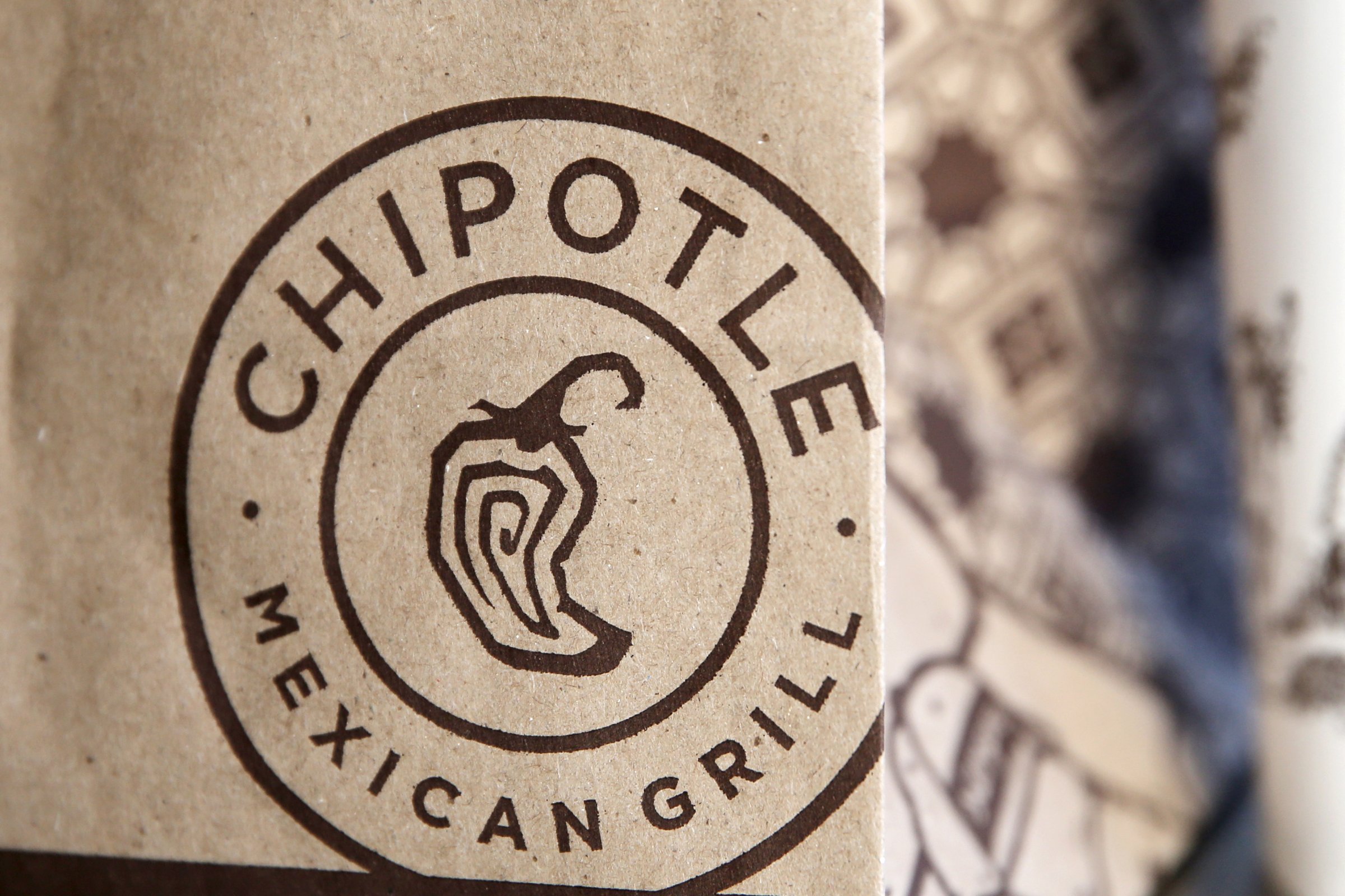 A Chipotle logo is seen on one of their bags in Manhattan, New York
