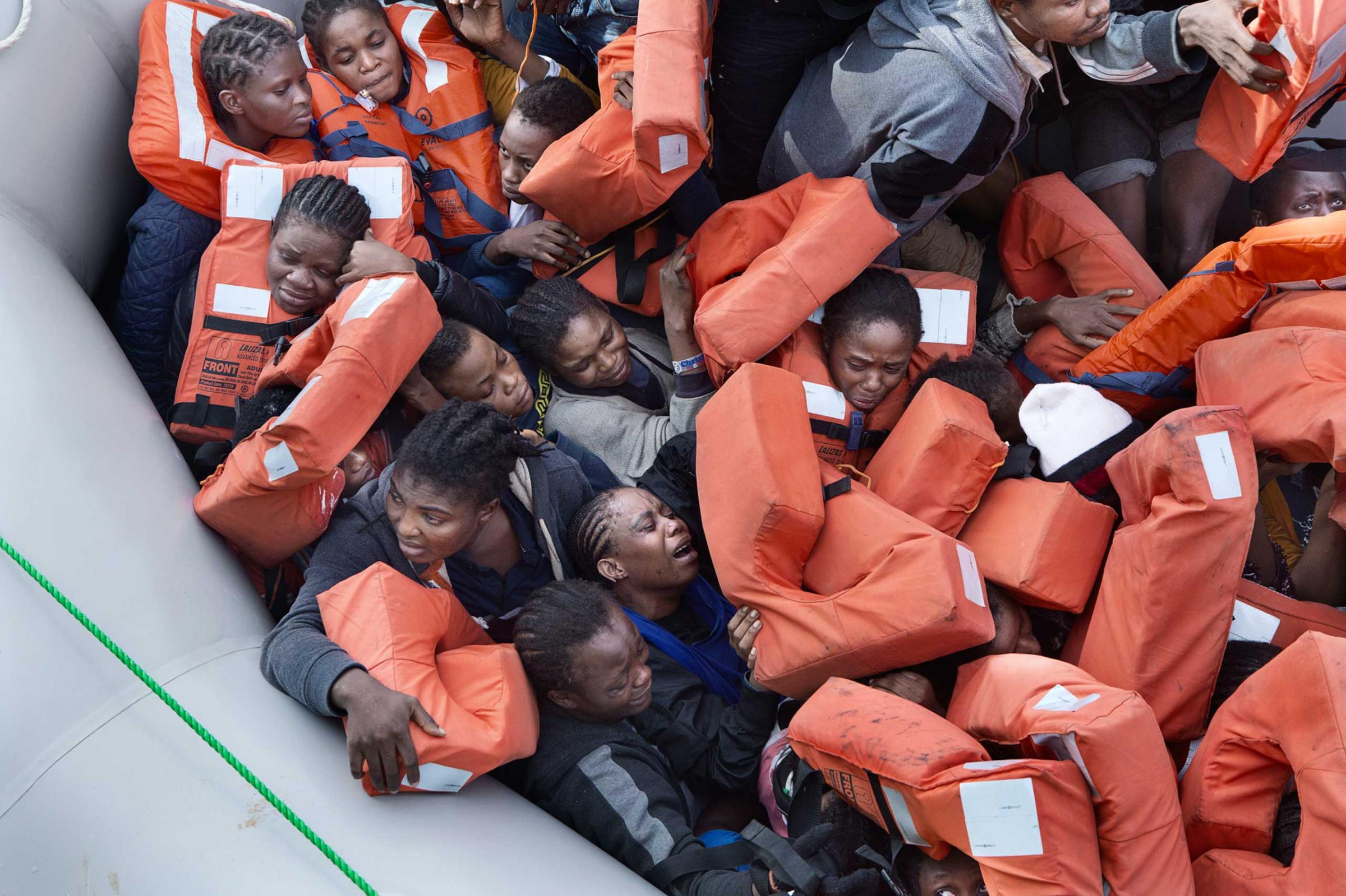 African migrants are rescued from their dinghy by MSF. The ship Bourbon Argos was patrolling the waters off Libya when it encountered a dinghy carrying 93 migrants of different nationalities, including 31 women.