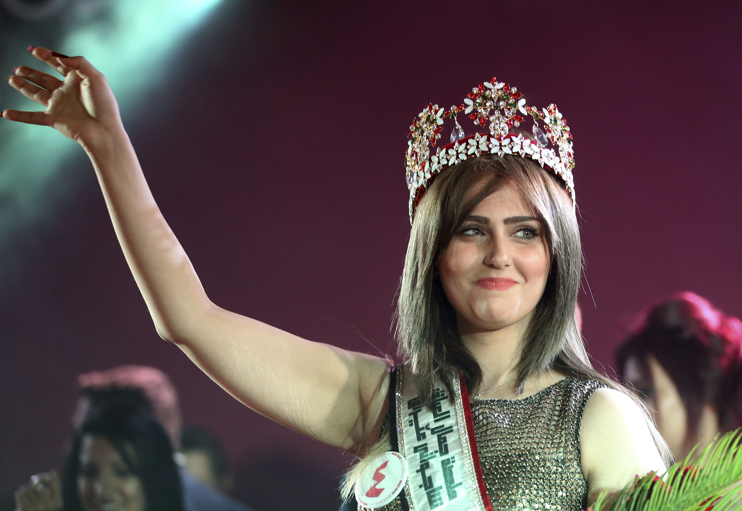 Shaima Qassim, celebrates after being crowned at the end of the 2015 Miss Iraq Final in Baghdad, Iraq on Dec. 19, 2015. (Karim Kadim—AP)