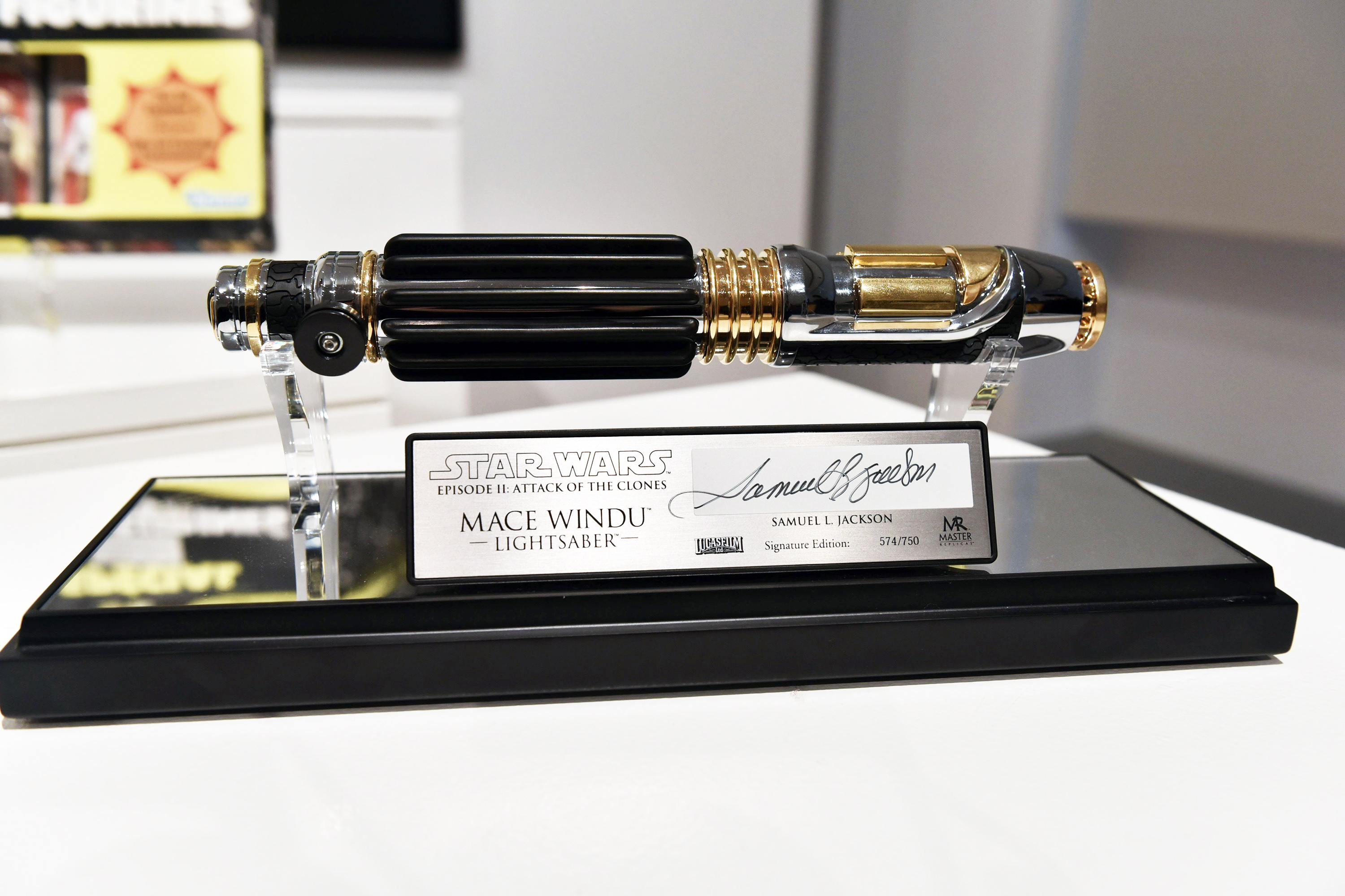 A Mace Windu lightsaber from 2002, signed by Samuel L. Jackson, is displayed at Sotheby's in New York City on Dec. 2, 2015.