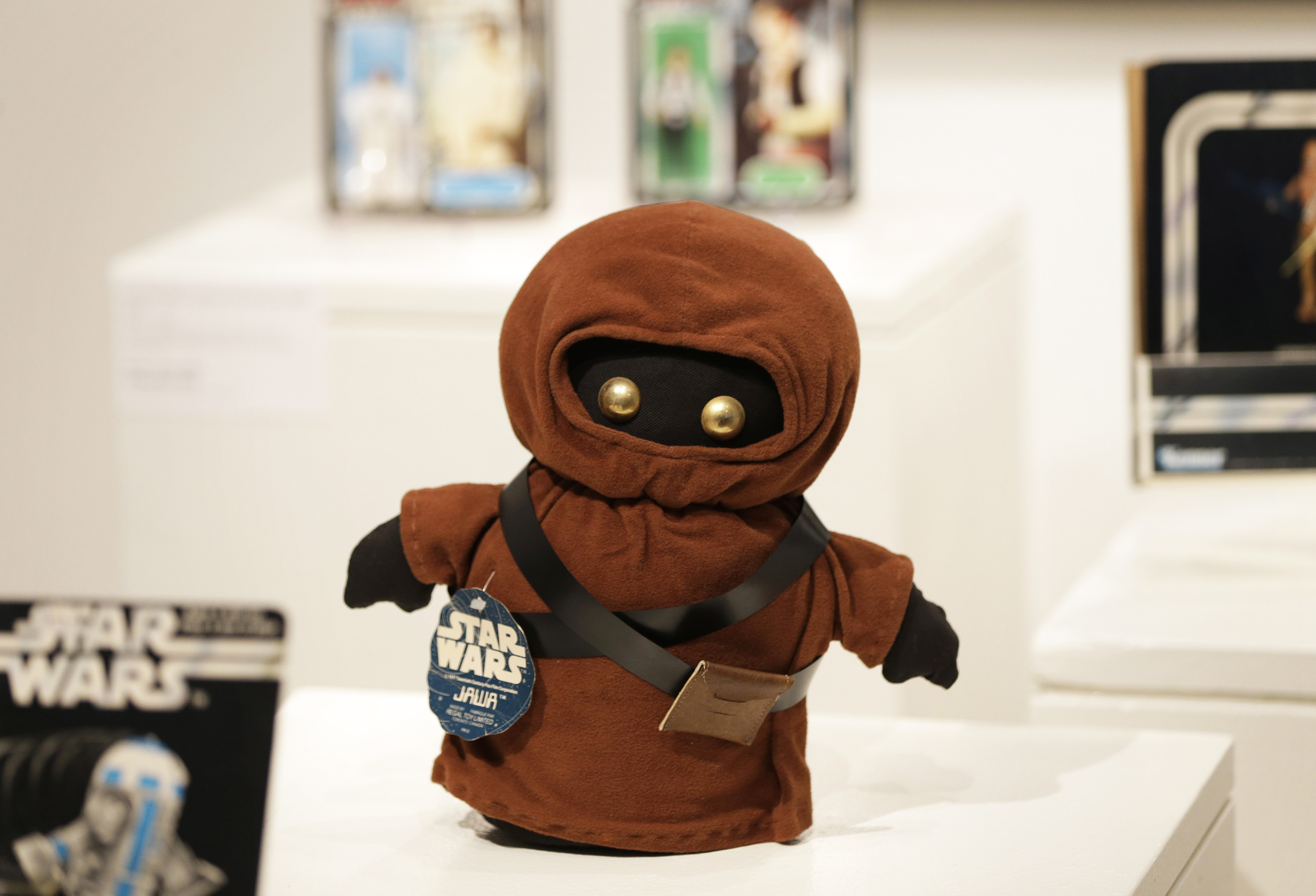 A plush Jawa doll is displayed at Sotheby's in New York City on Dec. 2, 2015.