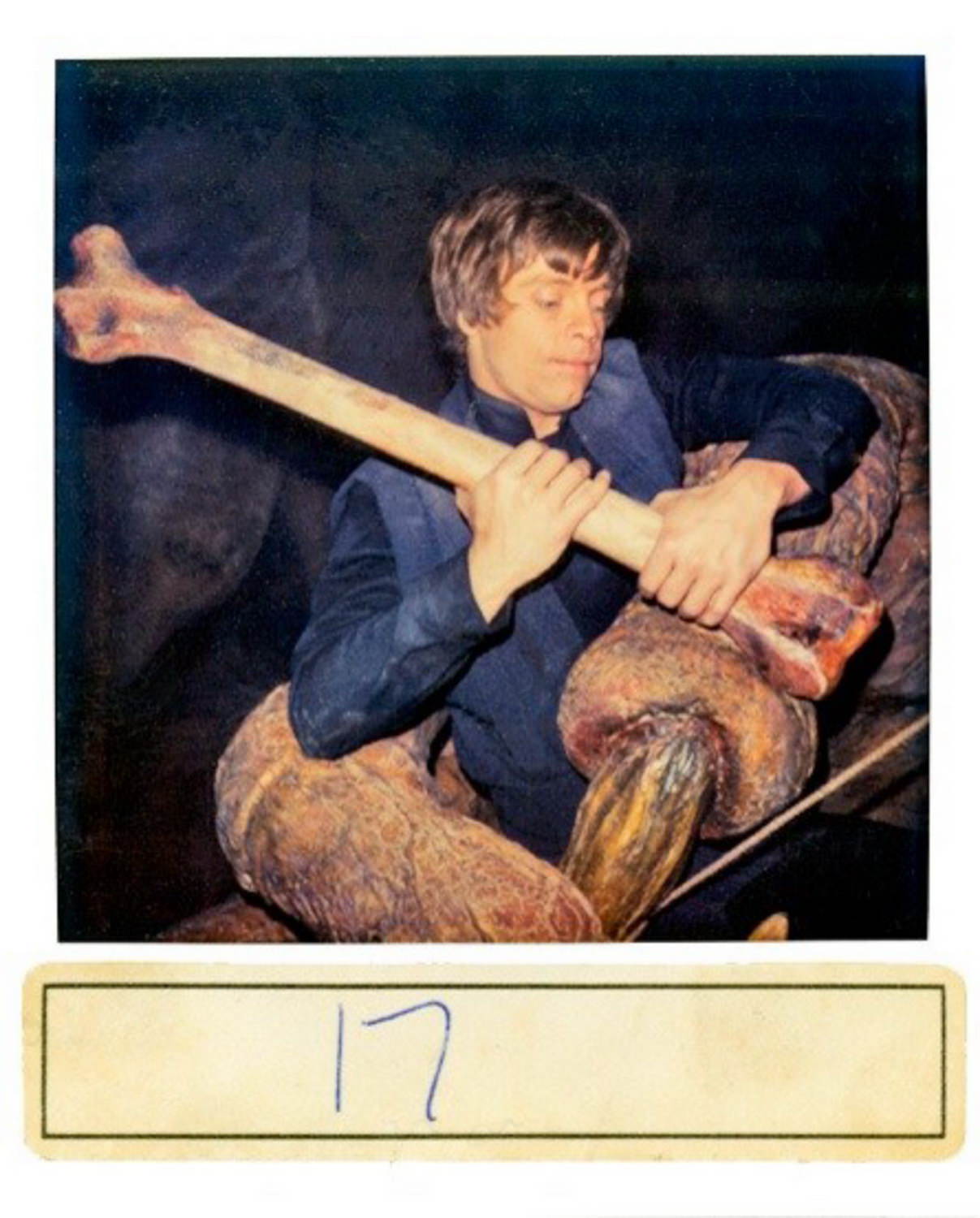 Luke Skywalker in the grip of the rancor.
