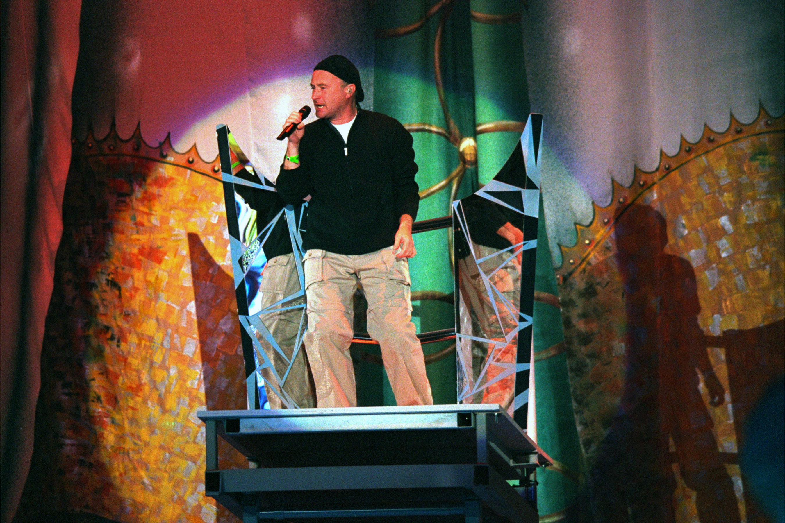 Phil Collins performs during Super Bowl XXXIV in Atlanta on Jan. 30, 2000.