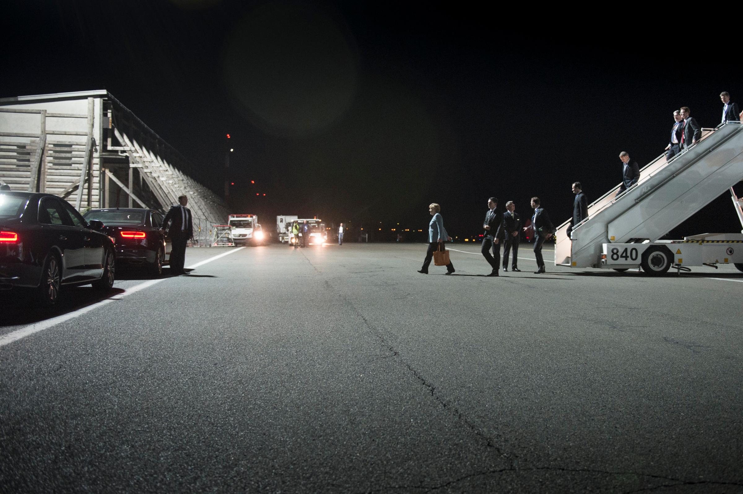 ChaChancellor Merkel returns to Berlin airport at 3 AM after a meeting at the European Council in Brussels. May 24, 2012.ncellor Merkel returns to Berlin airport at 3 A.M. after a meeting at the European Council in Brussels