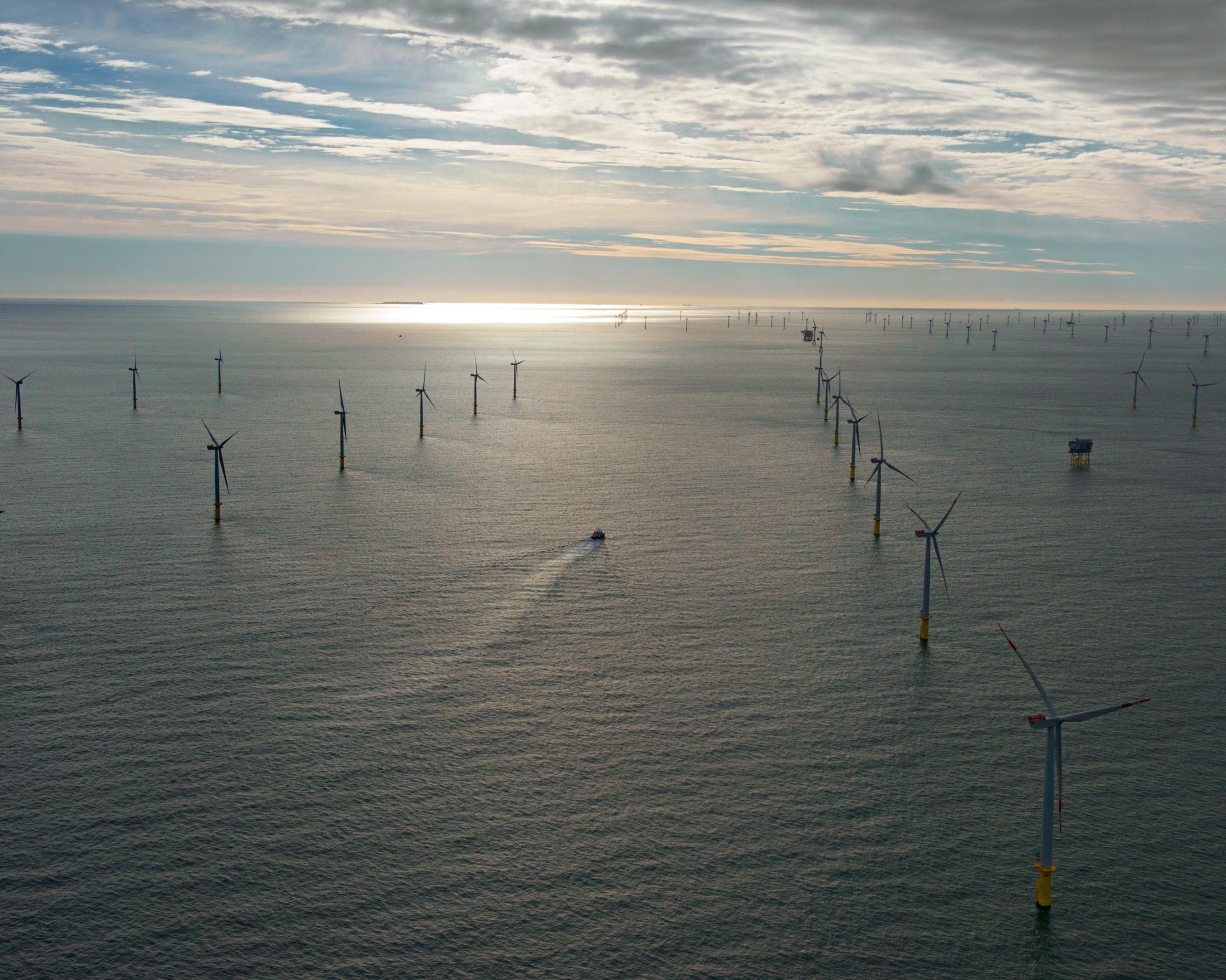 The Amrumbank West (foreground), Nordsee Ost (middleground) and Meerwind Süd/Ost (background) wind farms in the North Sea off of Hamburg, Germany.