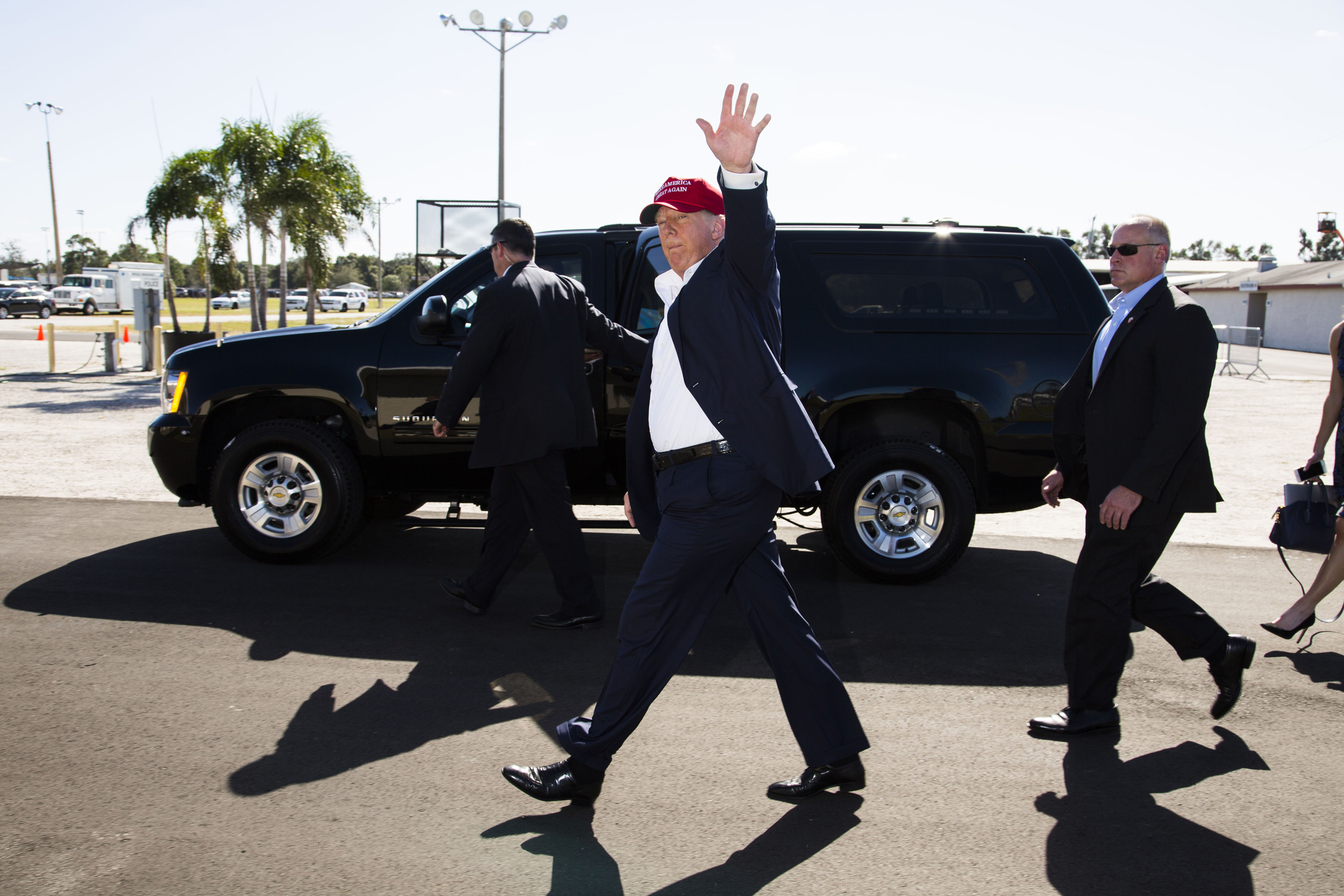Republican presidential candidate Donald Trump waves to supporters at a campaign rally in Sarasota, Fla. Nov. 28, 2015.
