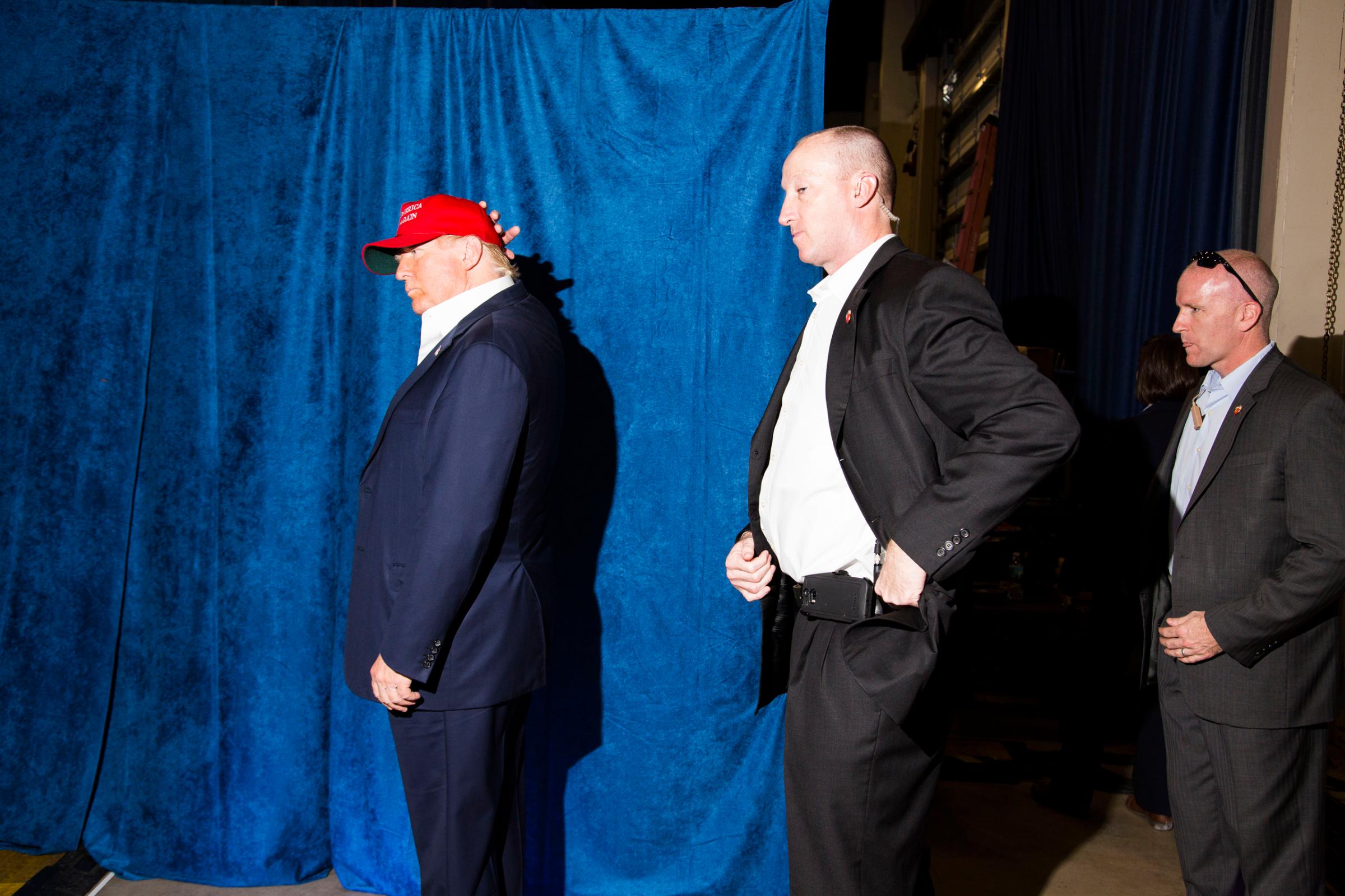 Republican presidential candidate Donald Trump backstage at a campaign rally in Sarasota, Fla. Nov. 28, 2015.